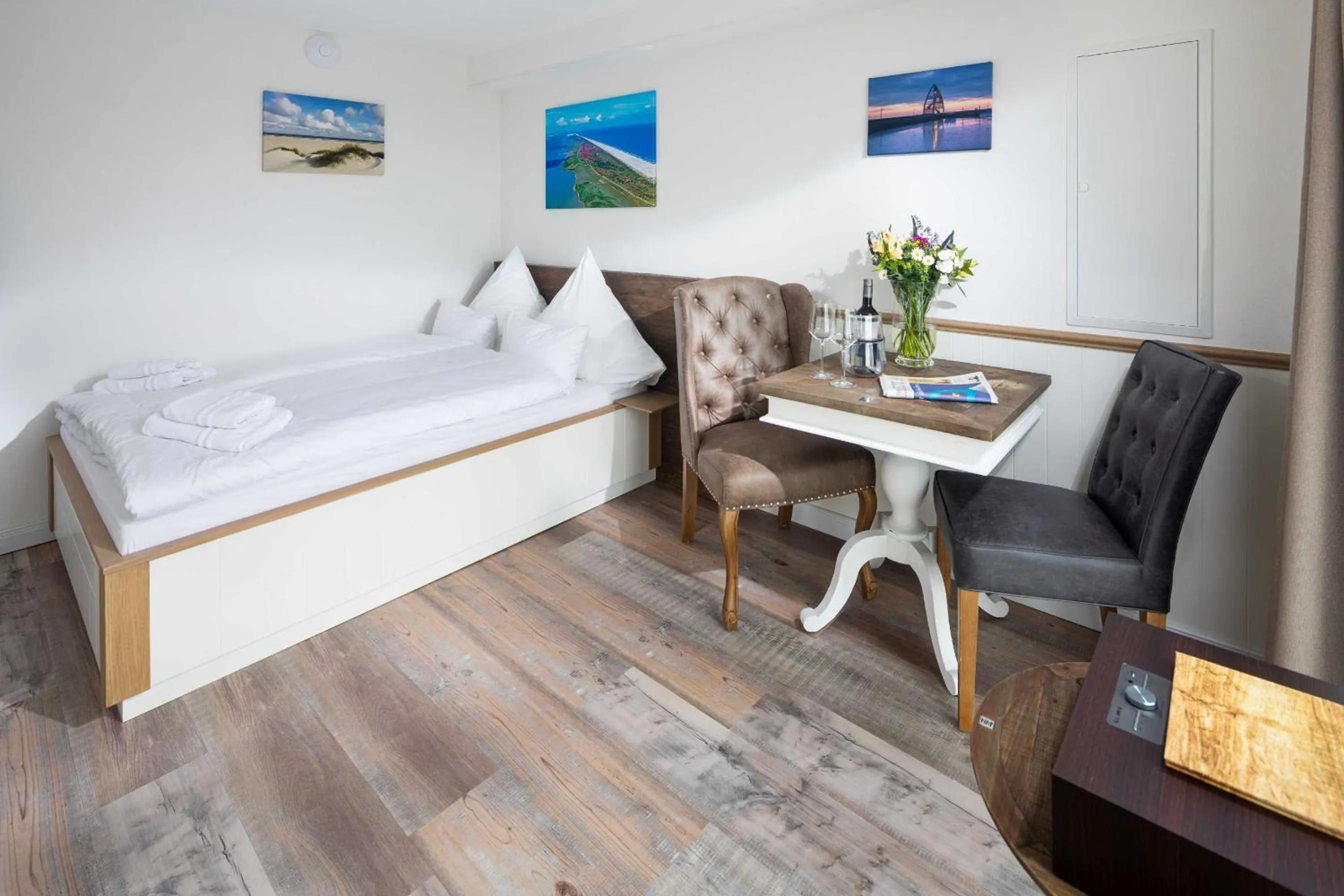 Living room, Bed in Heimathafen Juist