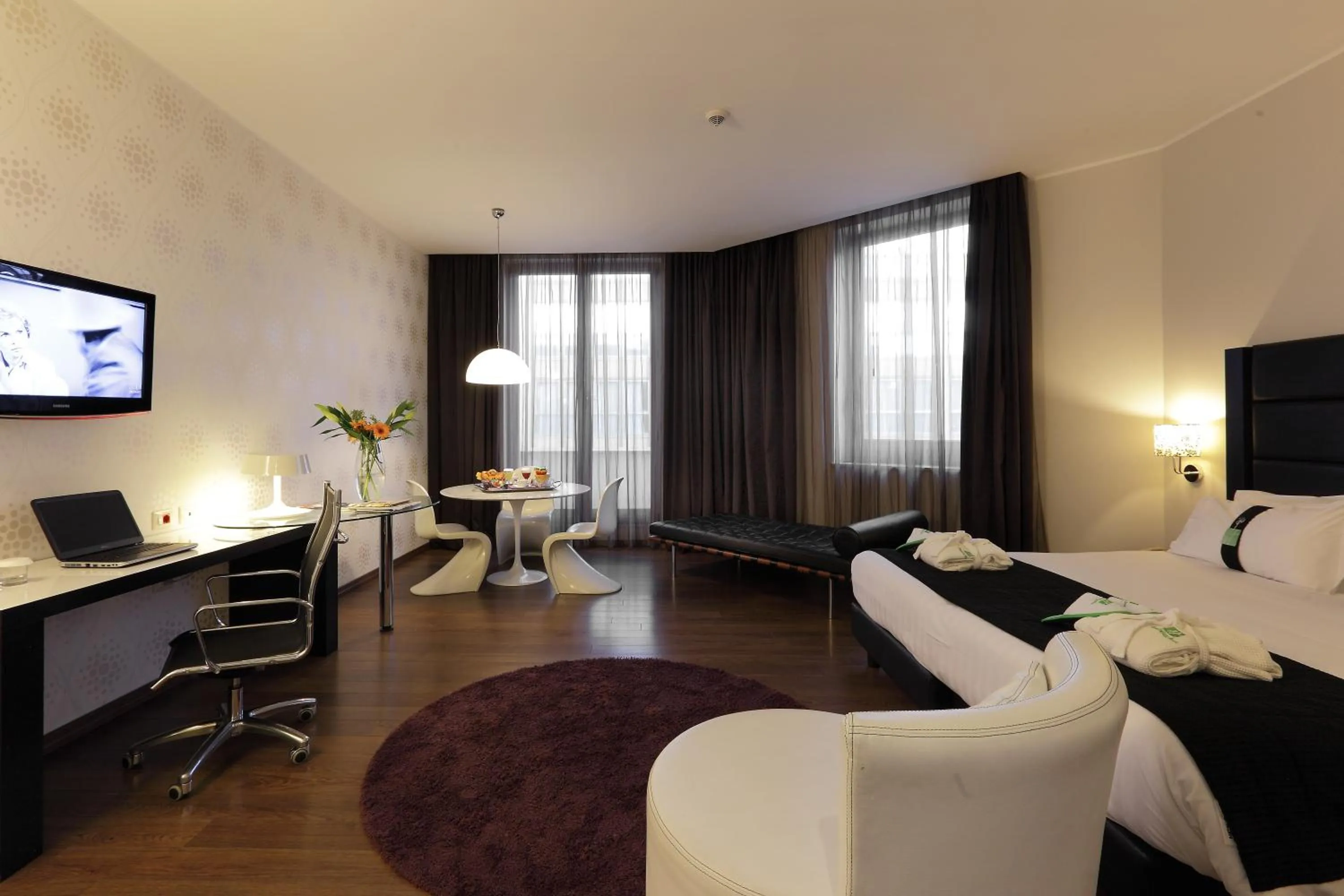 Photo of the whole room, Bed in Holiday Inn Genoa City by IHG