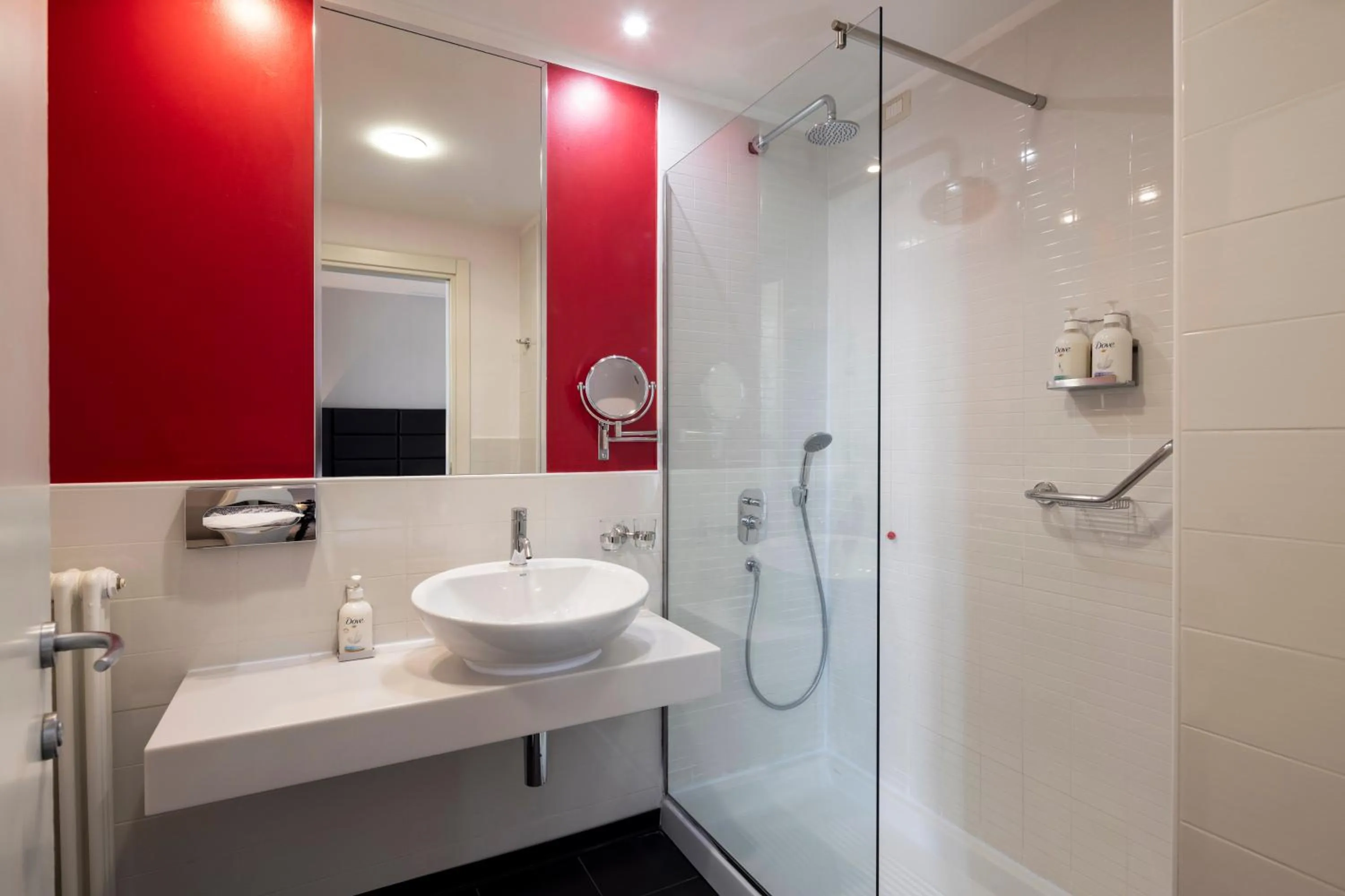 Shower in Holiday Inn Genoa City by IHG