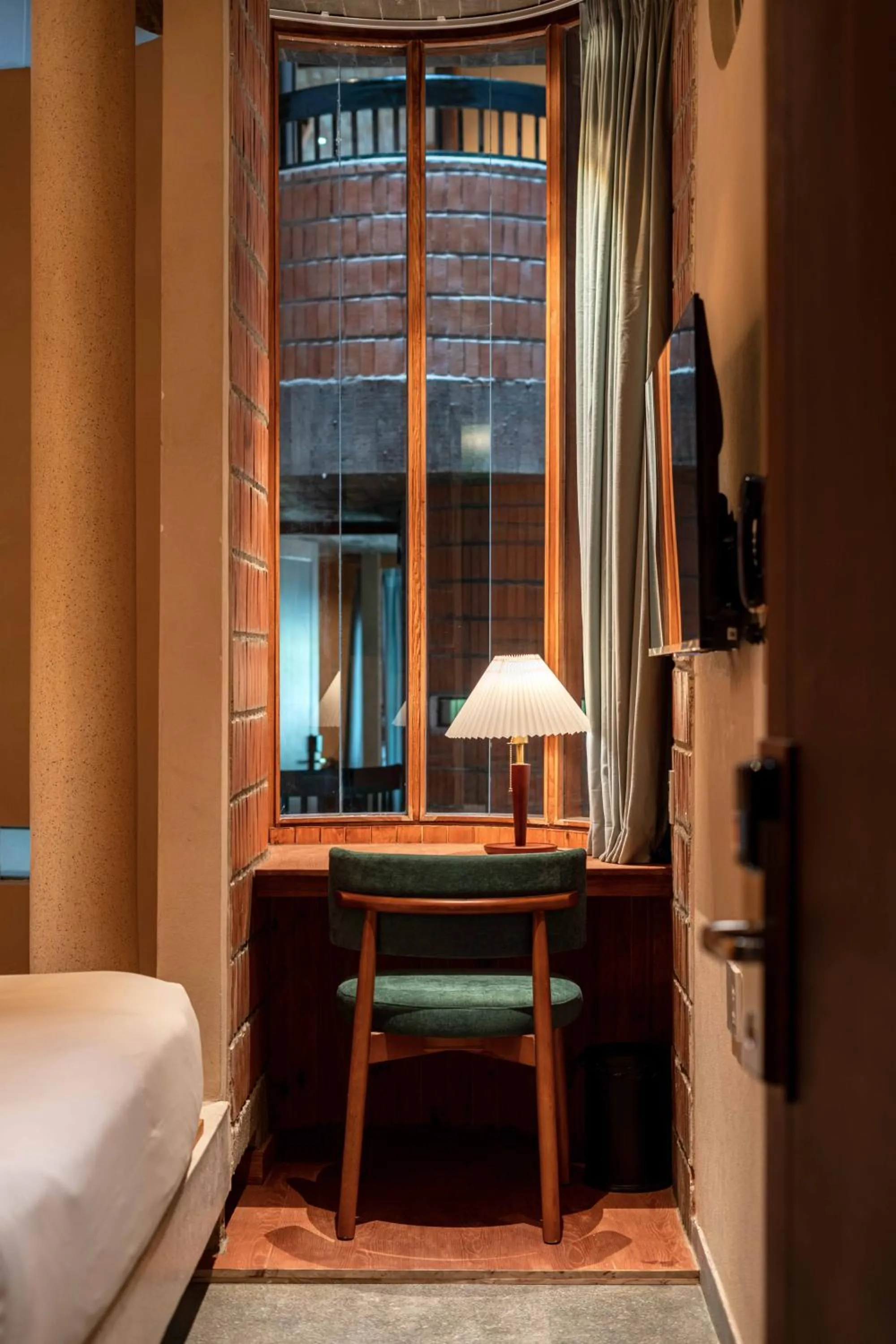 Seating area, Bed in The Memory Danang Boutique