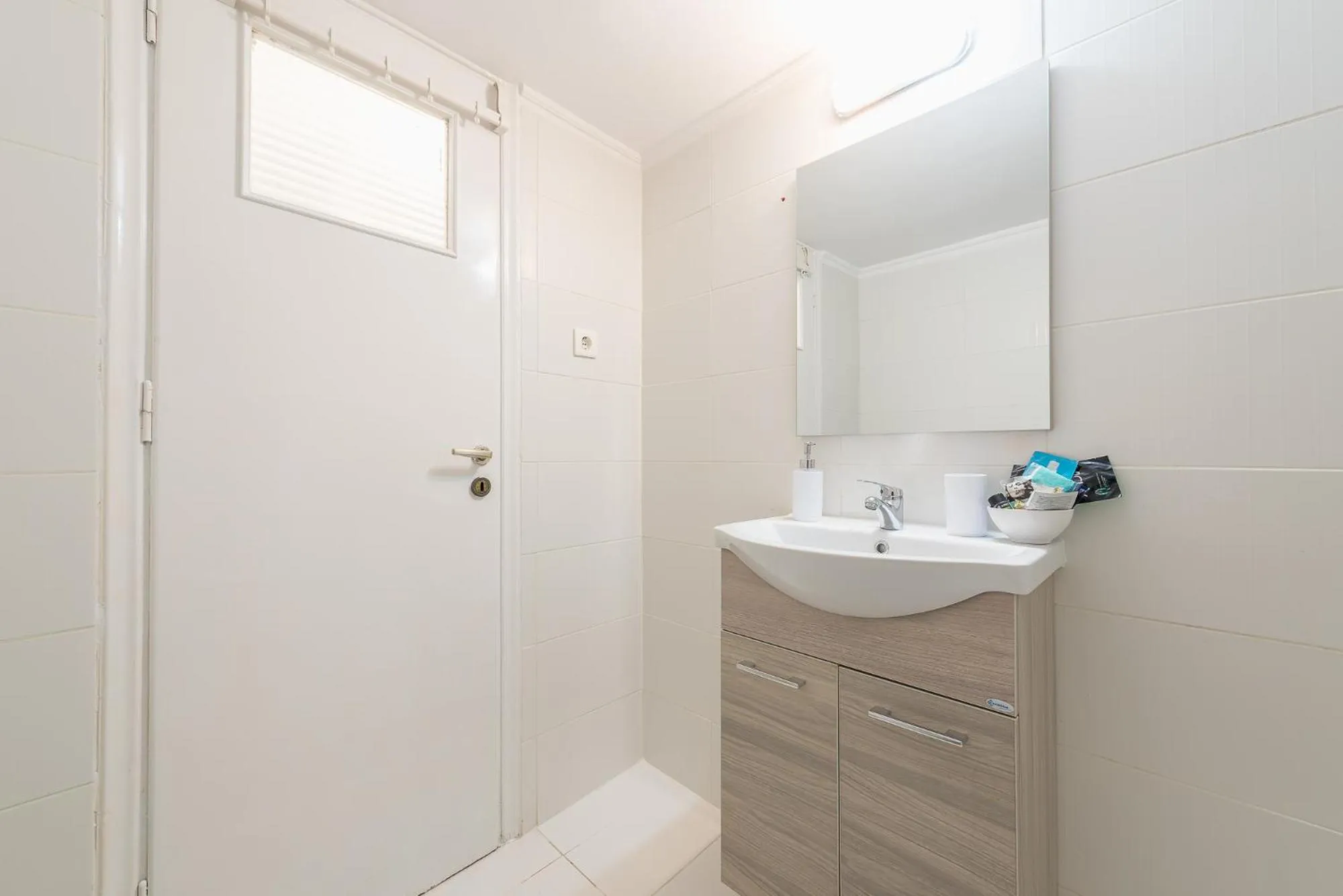 Toilet in Athens Boutique Apartment by Cloudkeys