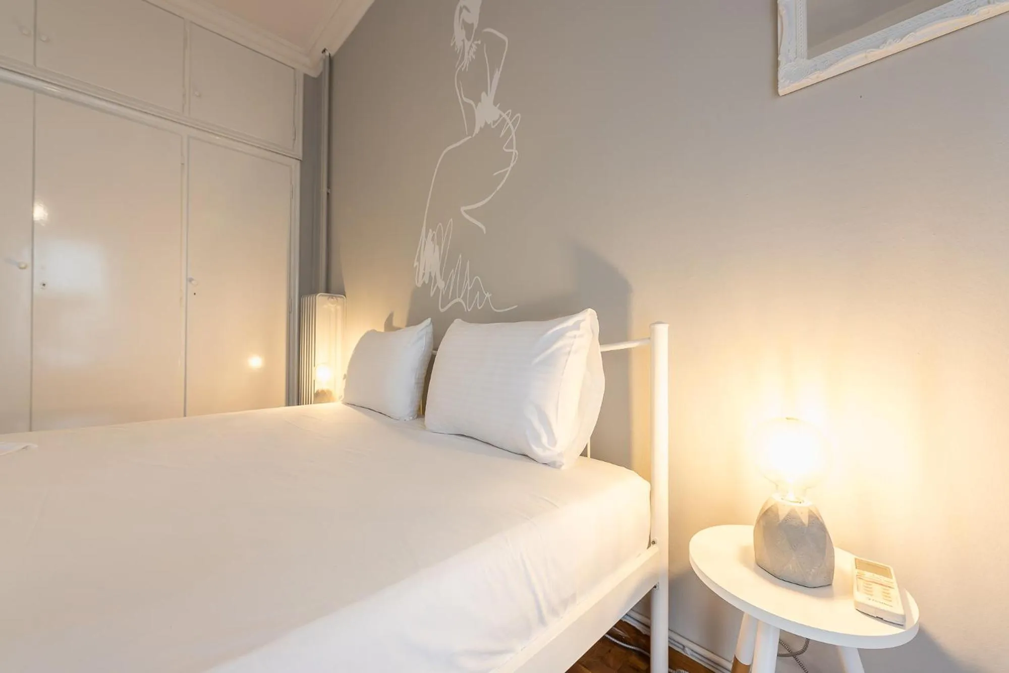 Bed in Athens Boutique Apartment by Cloudkeys