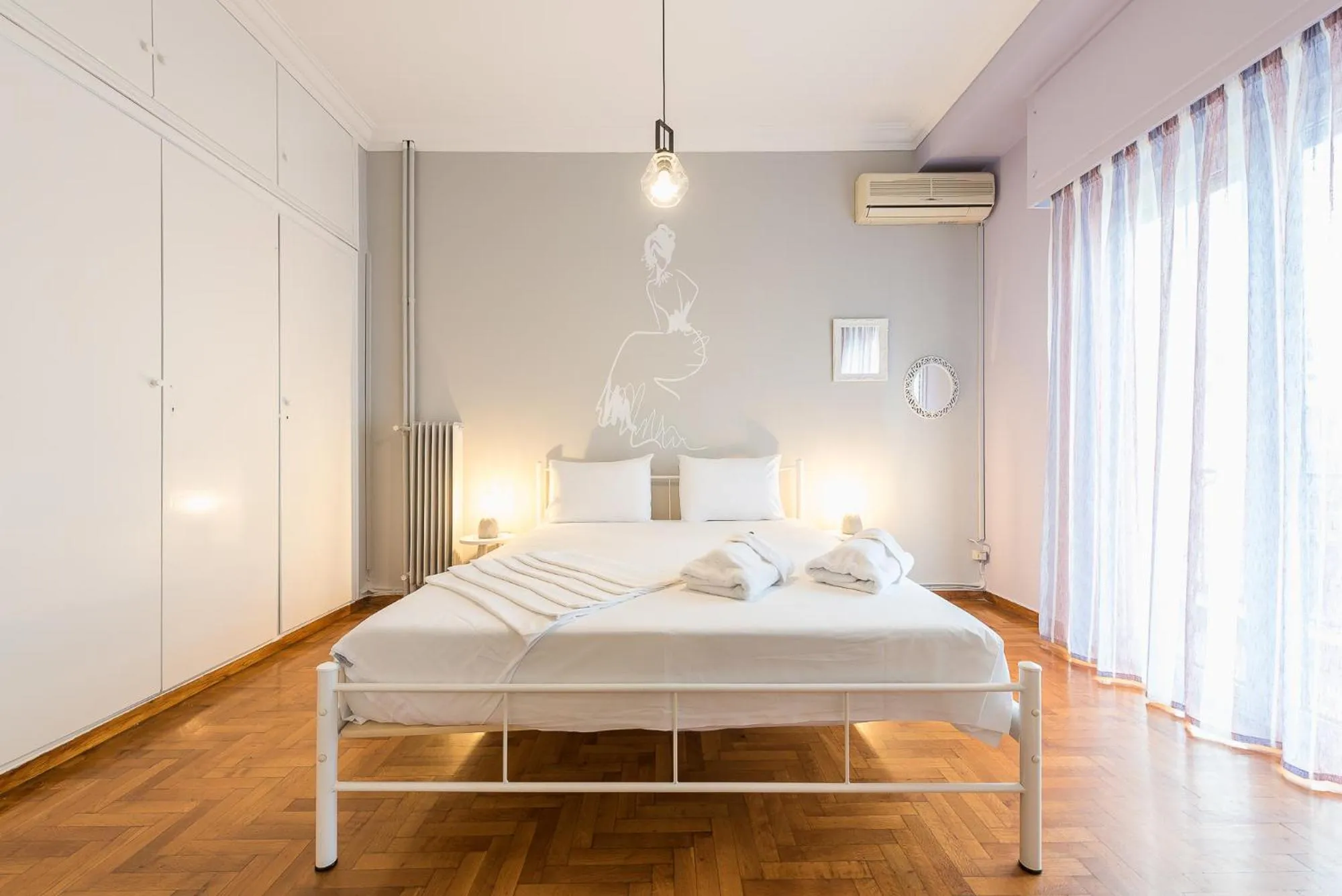 Bed in Athens Boutique Apartment by Cloudkeys