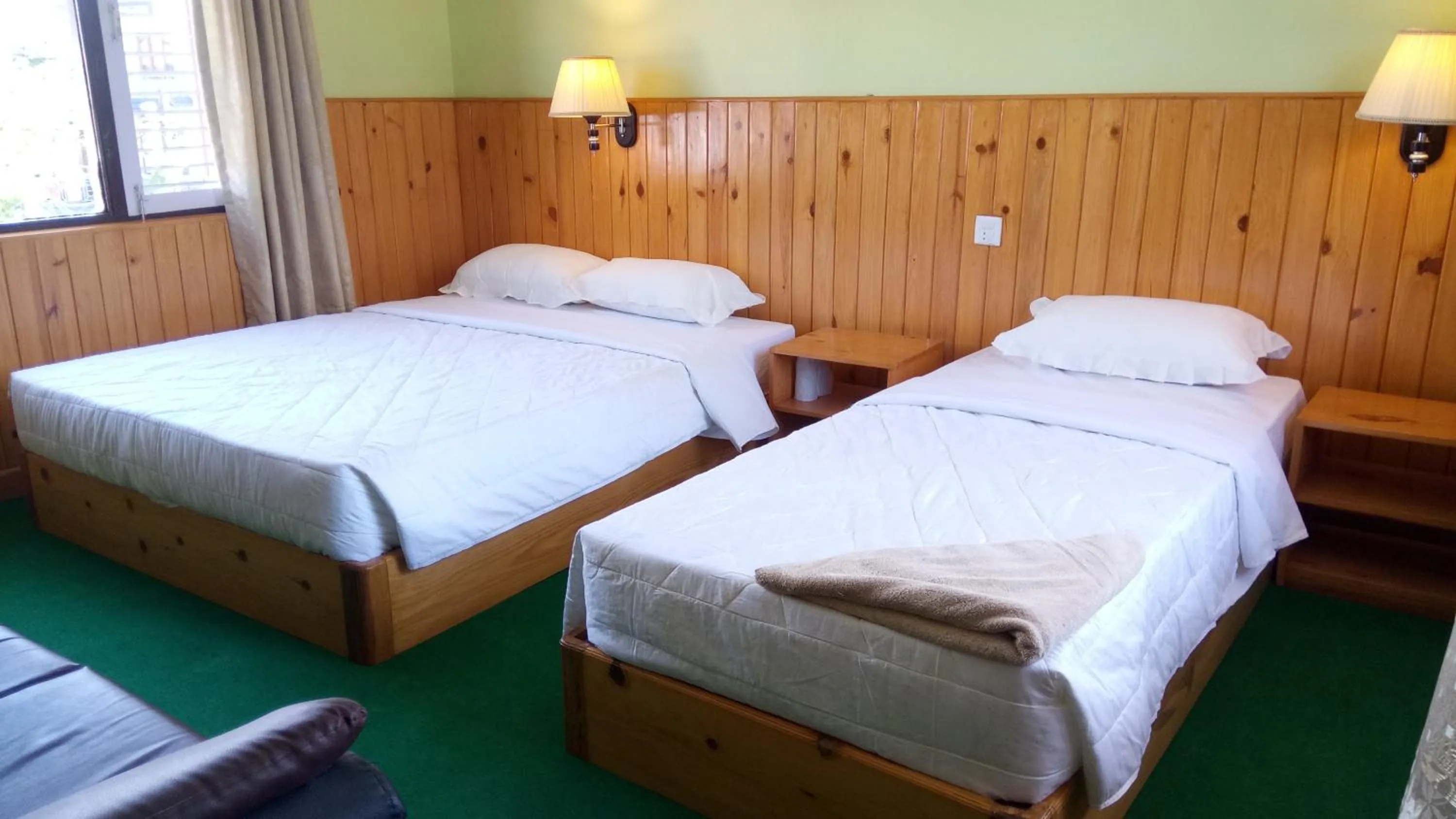 Bed in New Pokhara Lodge - Pokhara Lakeside