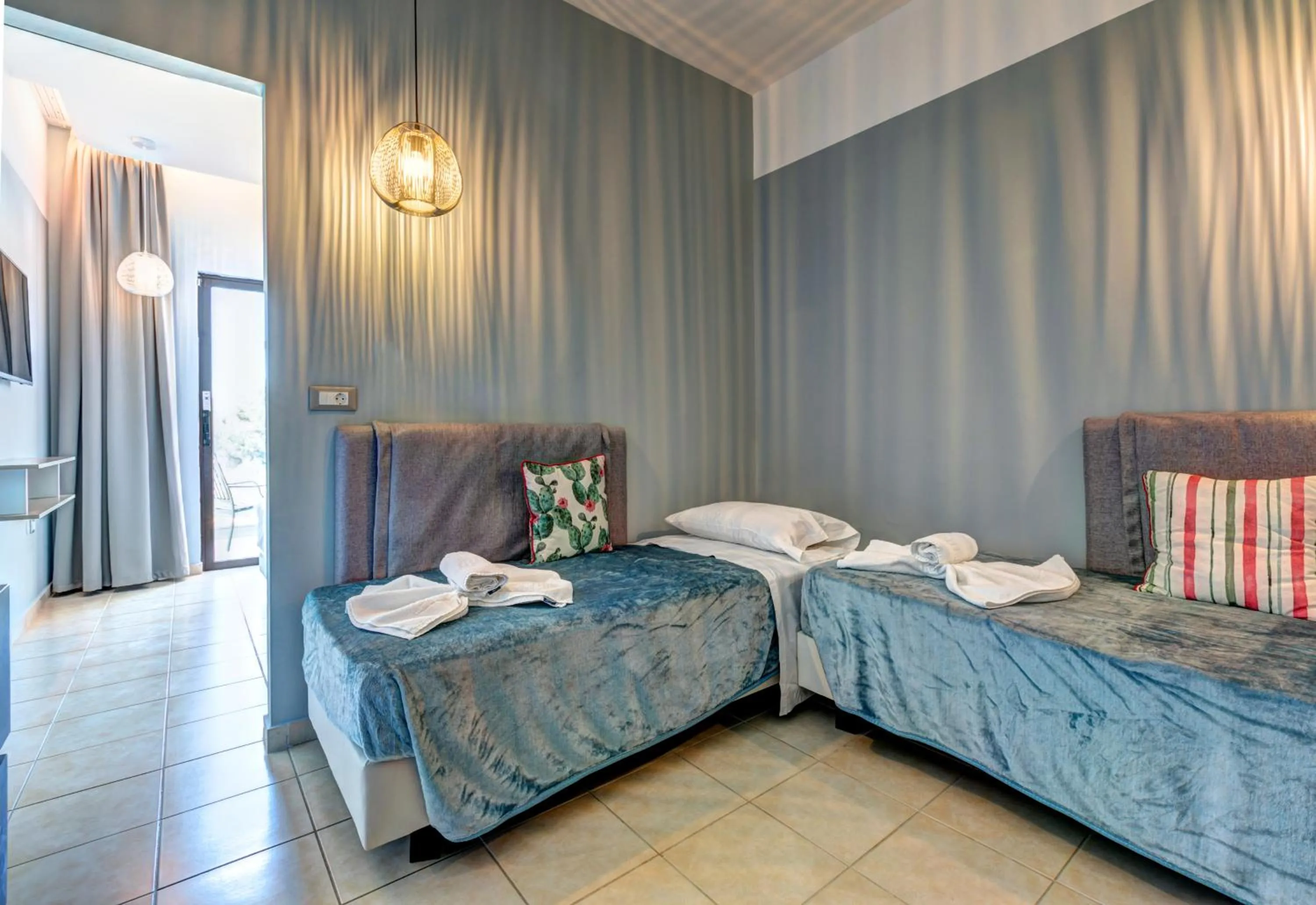 Bed in Lindos Breeze Beach Hotel