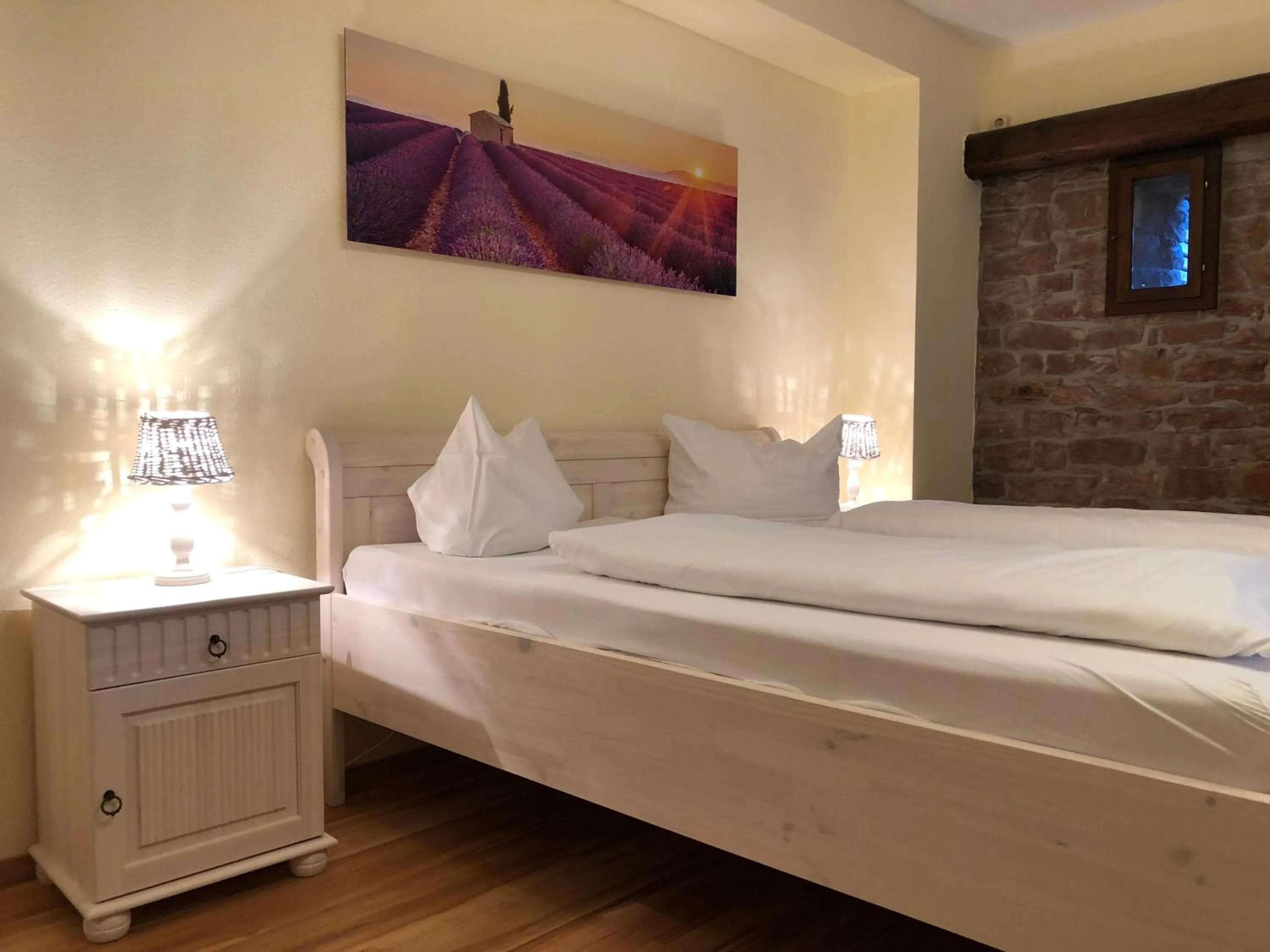 Bed in Hotel Weingärtner