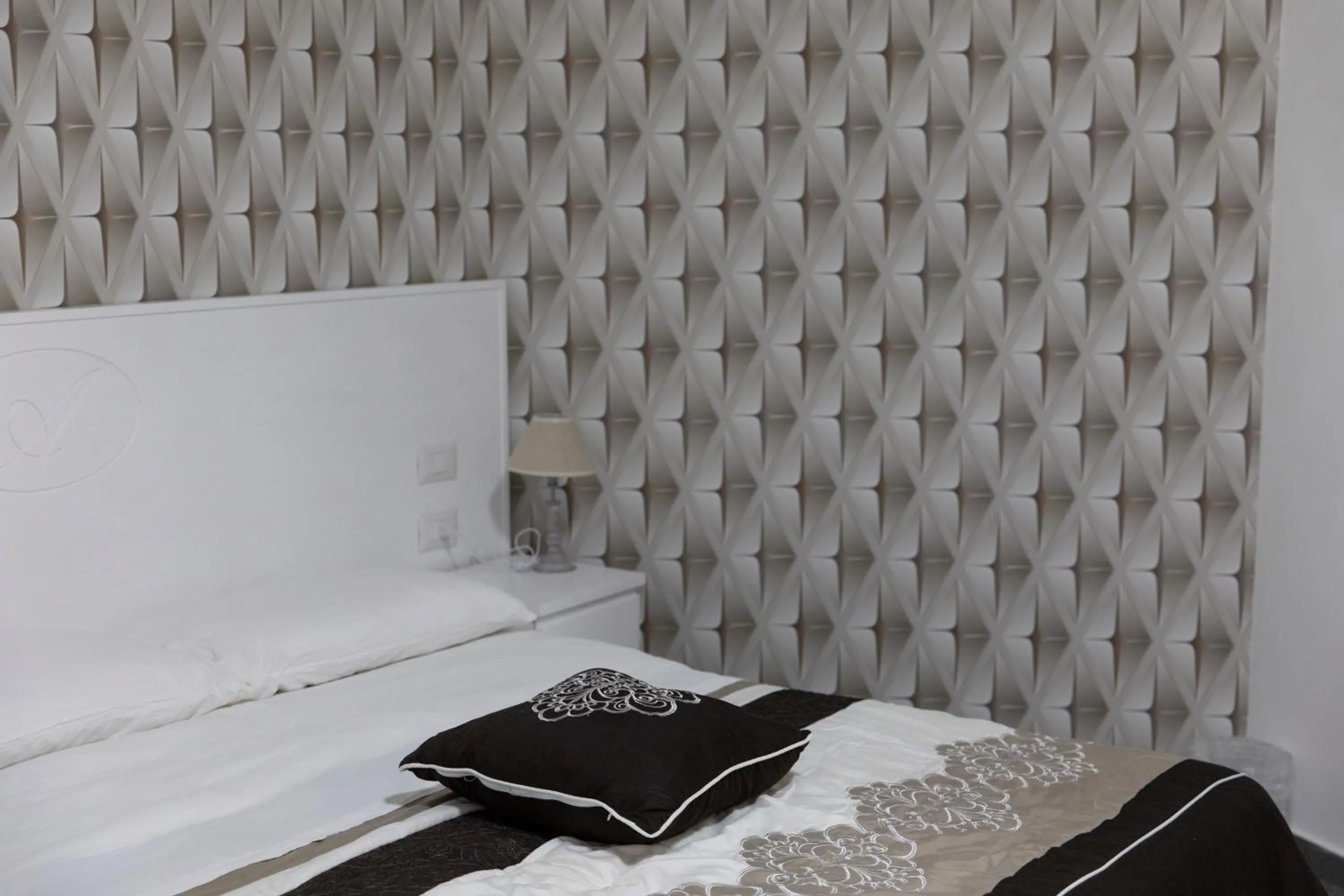 Bed in B&B Alambrado Rooms & Suites