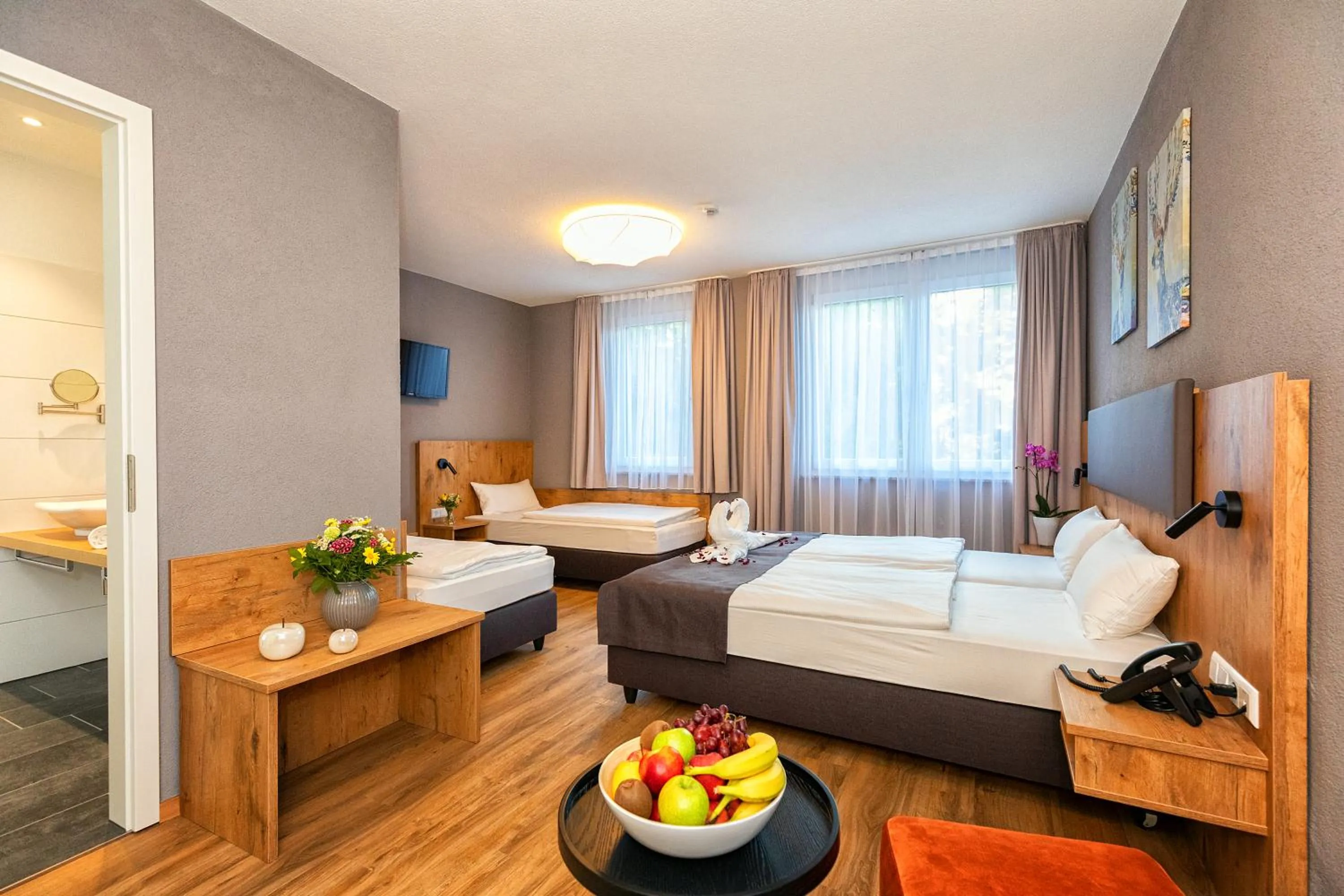 Photo of the whole room, Bed in Hotel La Mirabelle close to Europa Park