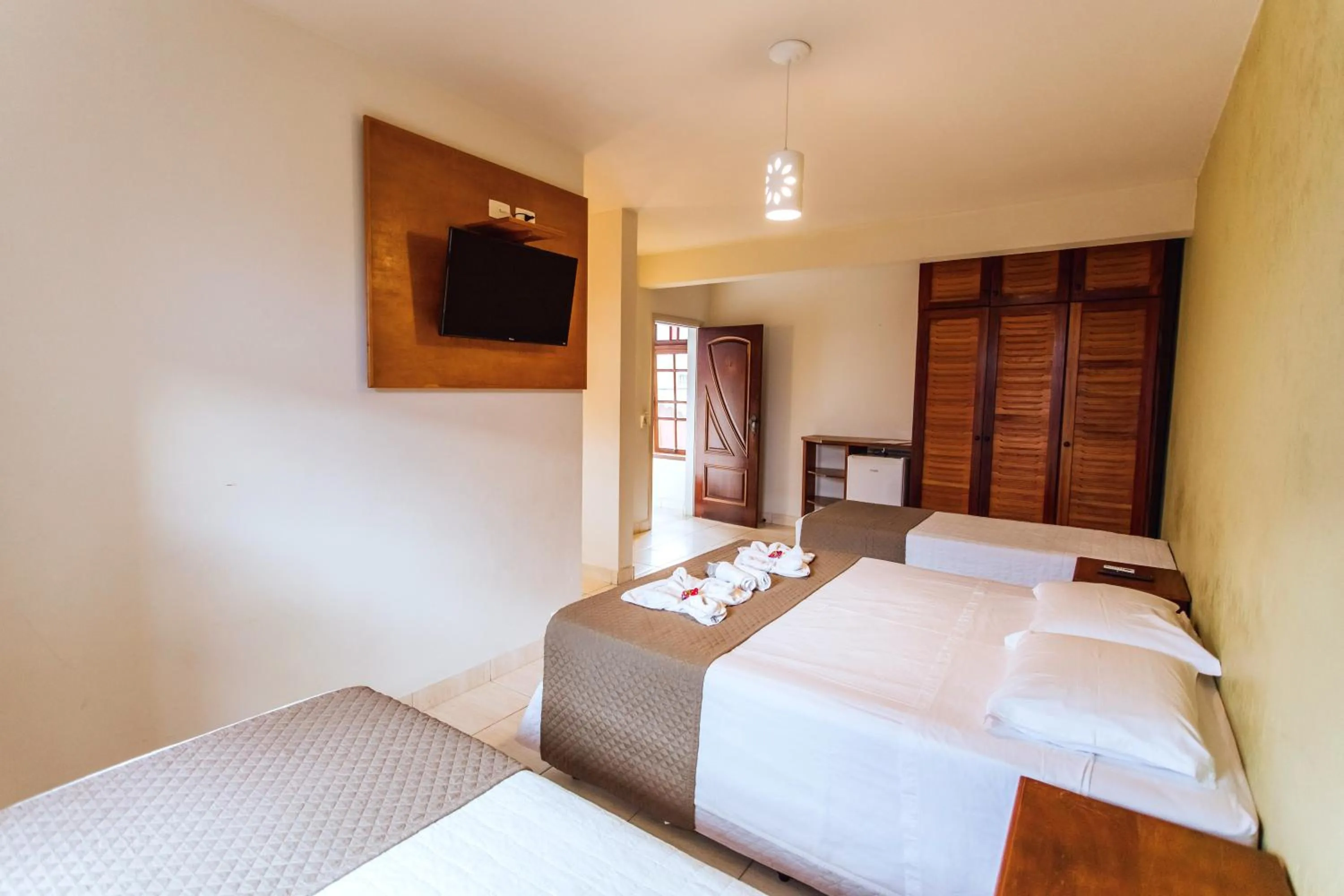 Bed in VELINN Pousada Villa Caiçara