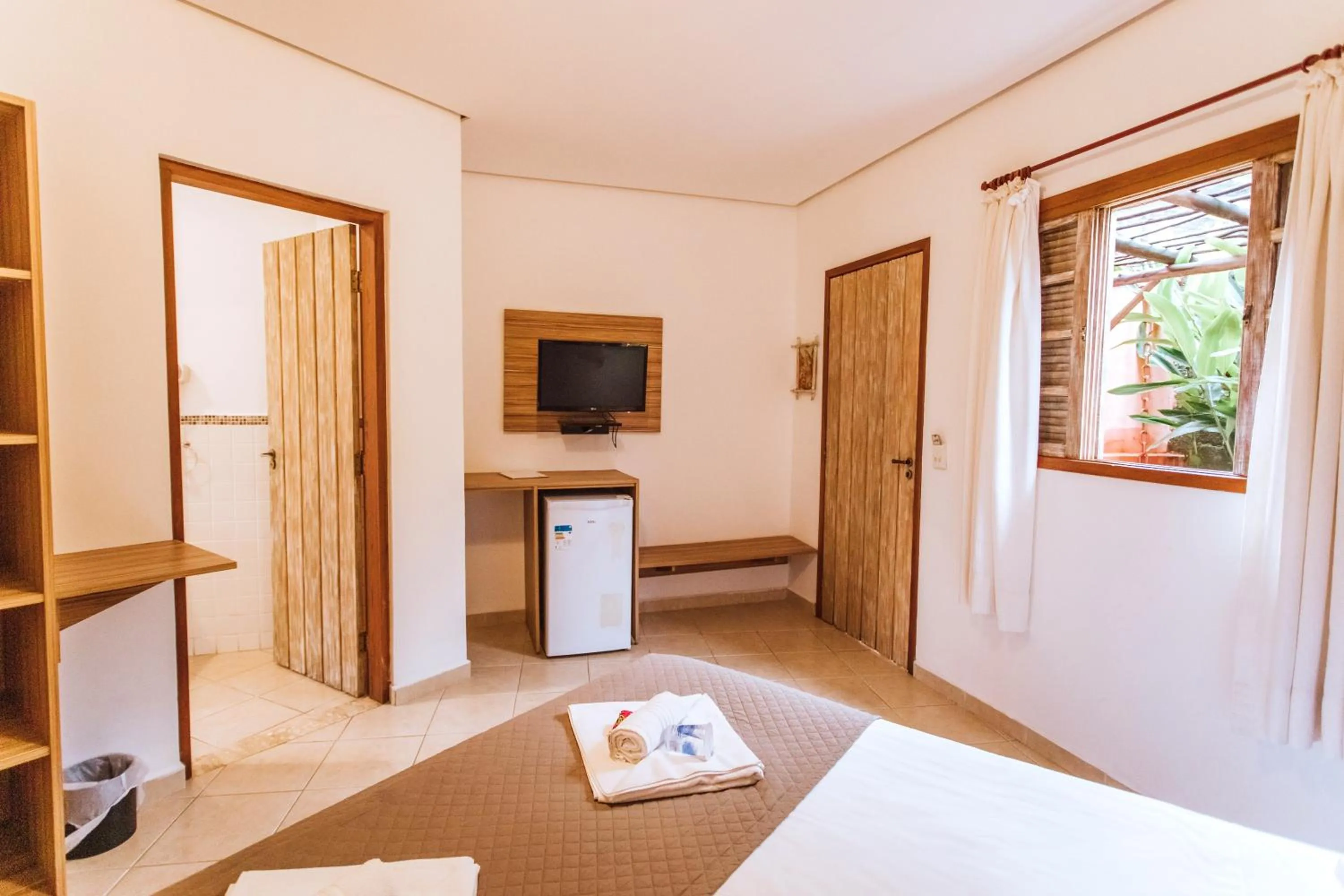 Bed in VELINN Pousada Villa Caiçara