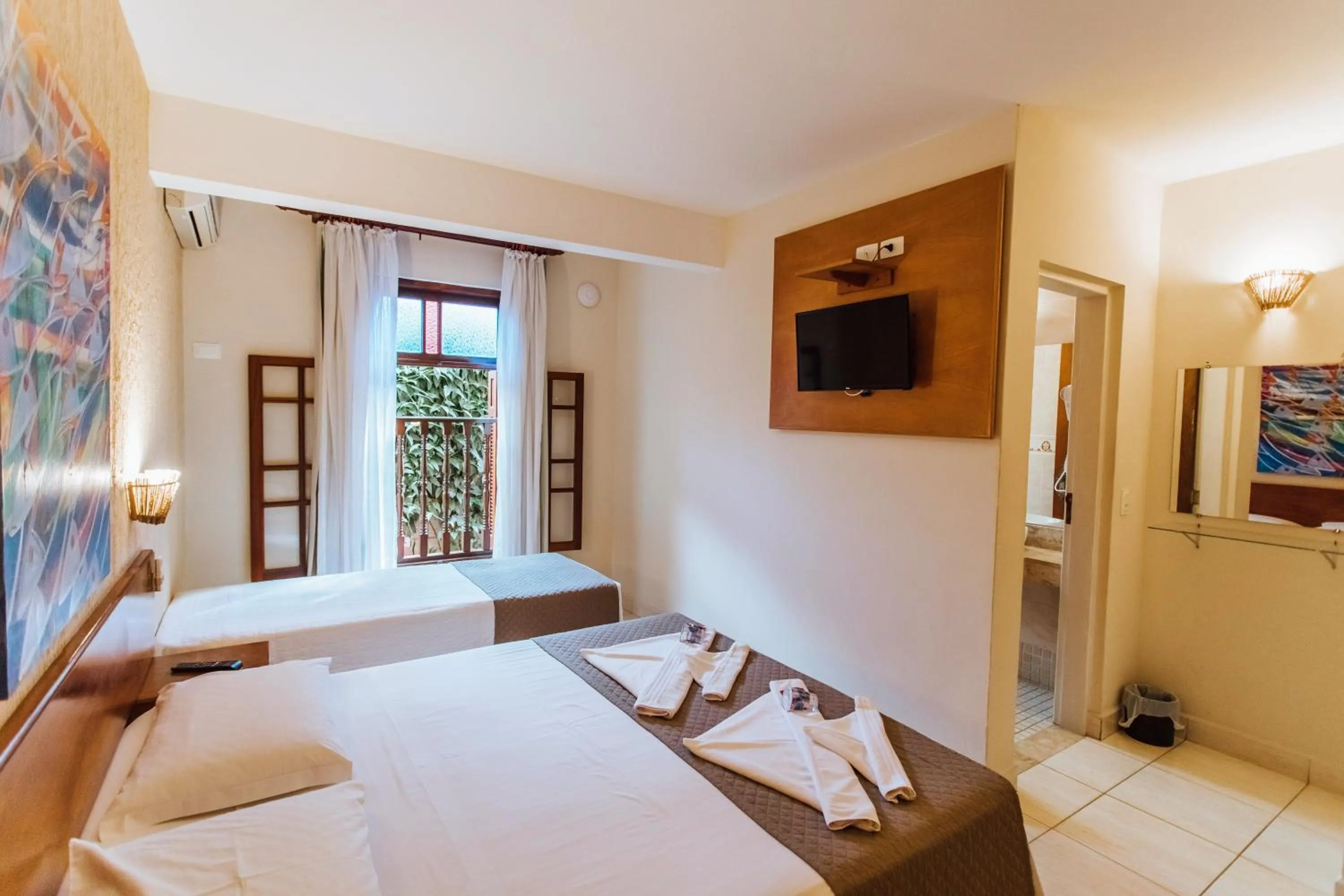 Bed in VELINN Pousada Villa Caiçara