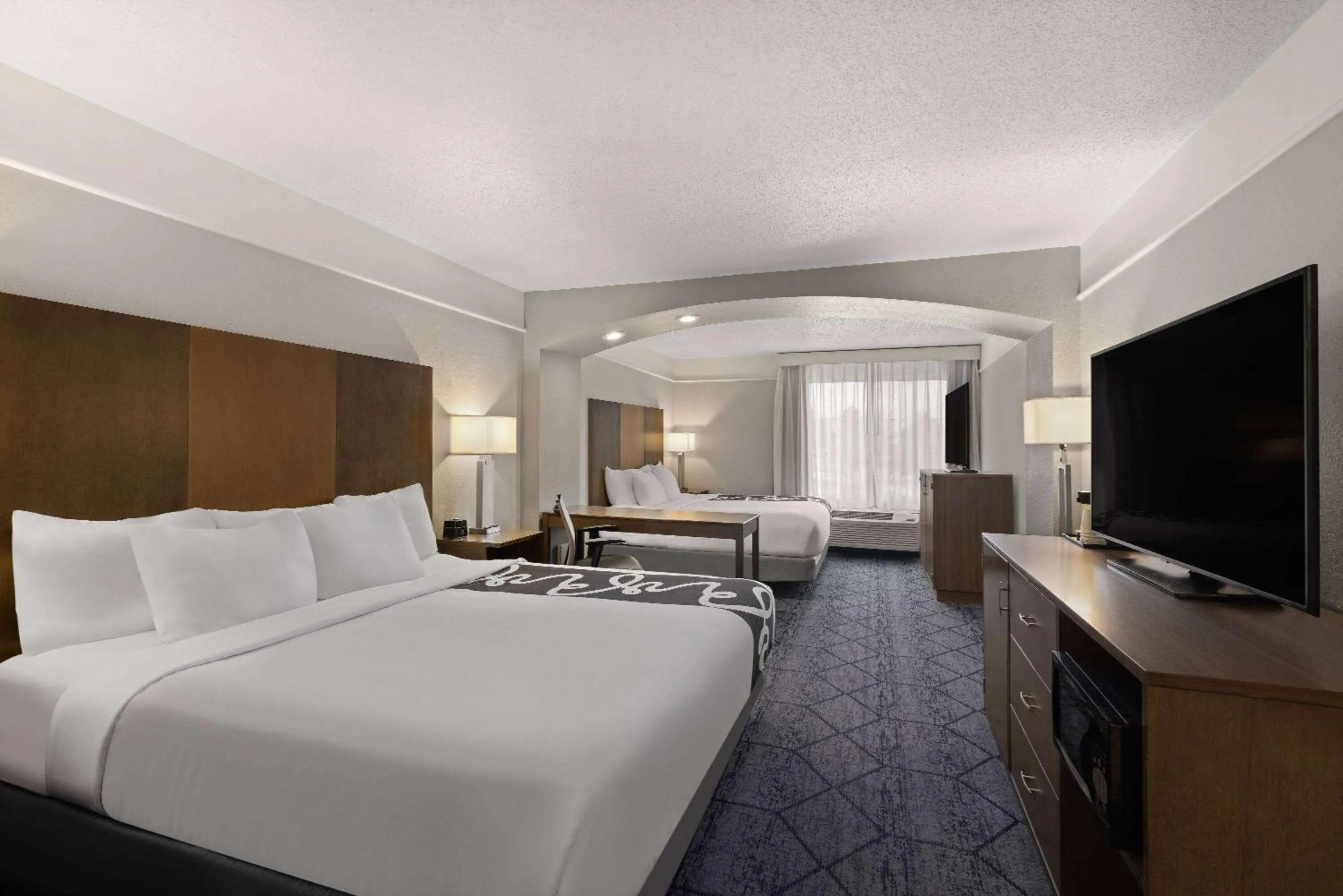 Photo of the whole room, Bed in La Quinta Inn and Suites by Wyndham at WaTiki Waterpark