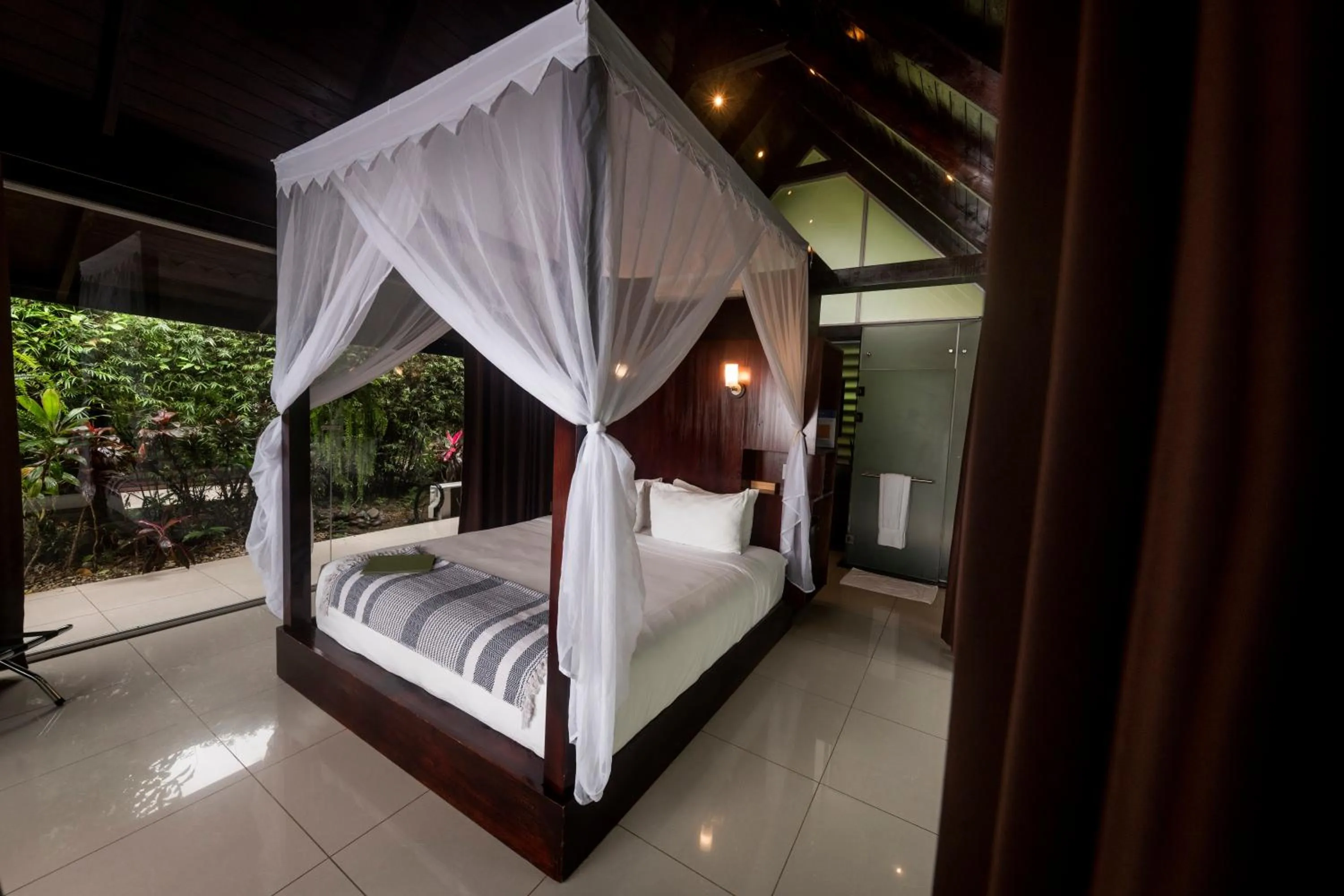 Bed in Oxygen Jungle Villas & Spa