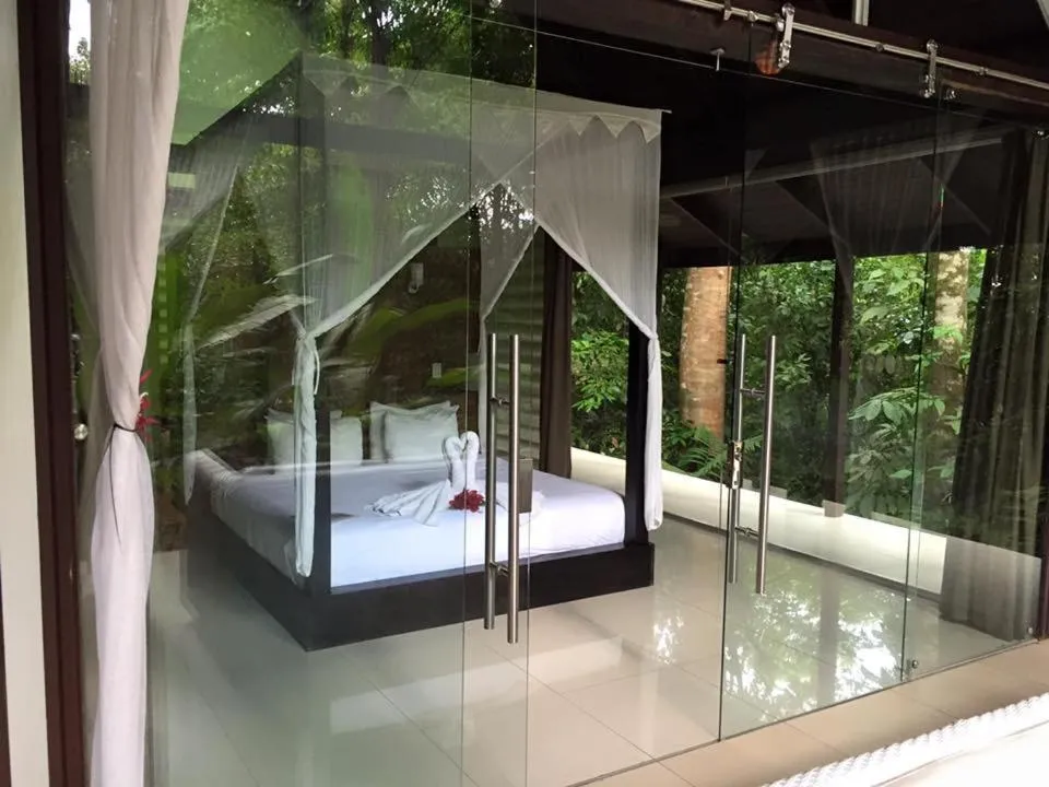 Bed in Oxygen Jungle Villas & Spa