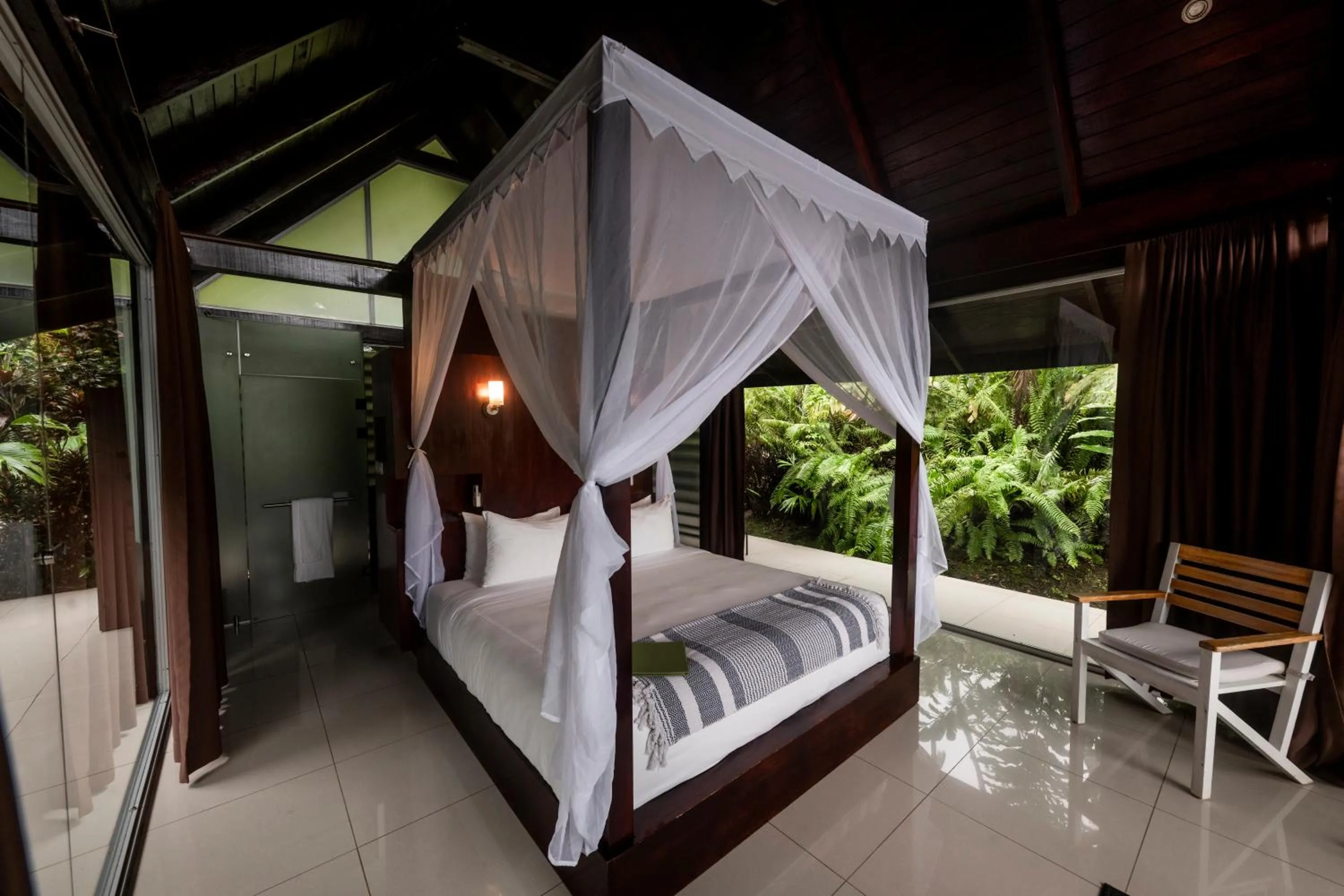 Bed in Oxygen Jungle Villas & Spa