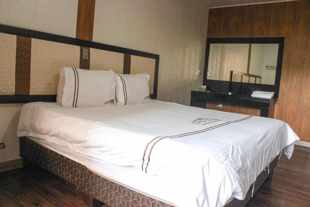 Bed in Hotel Castillo Resort