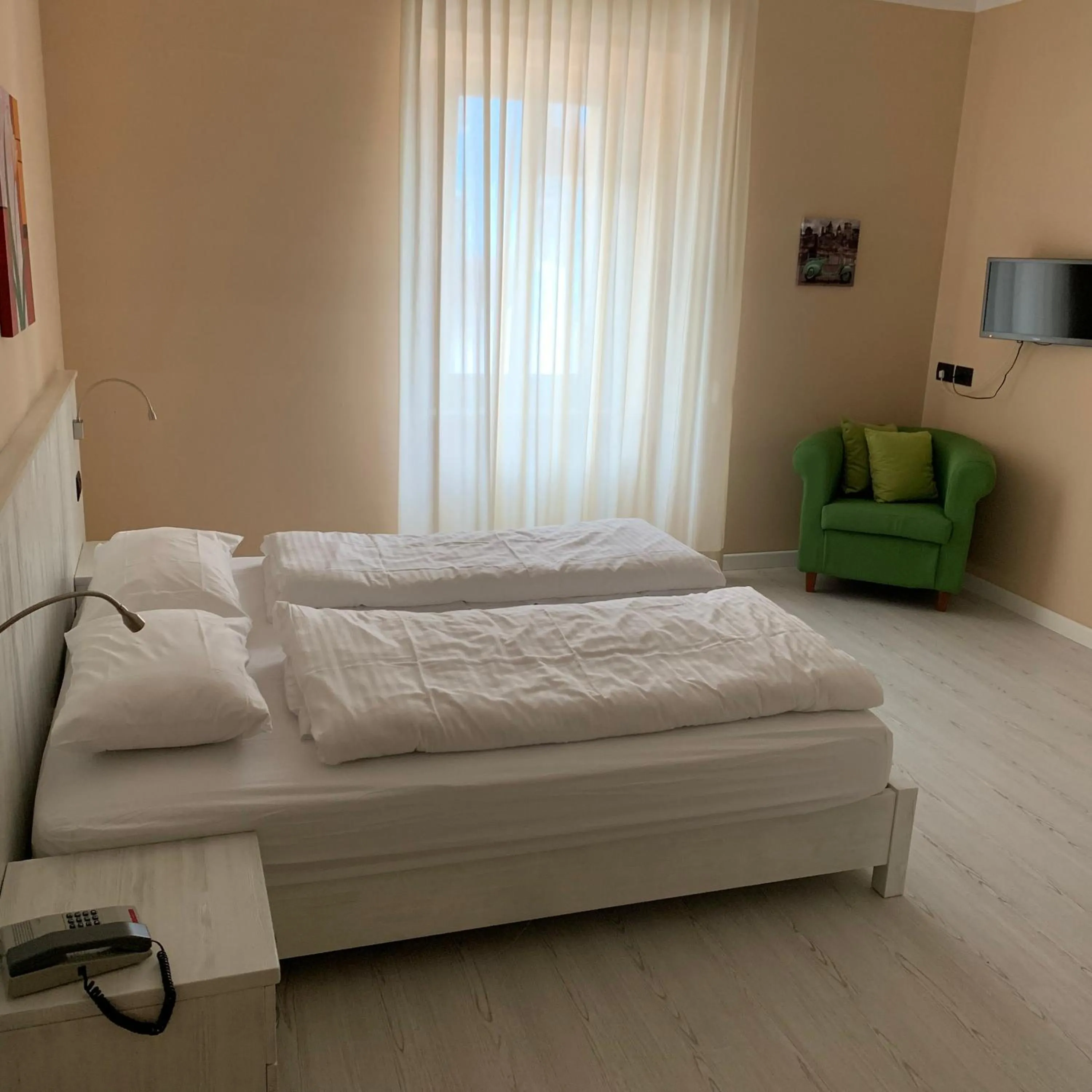 Bed in Hotel du Lac Parc & Residence