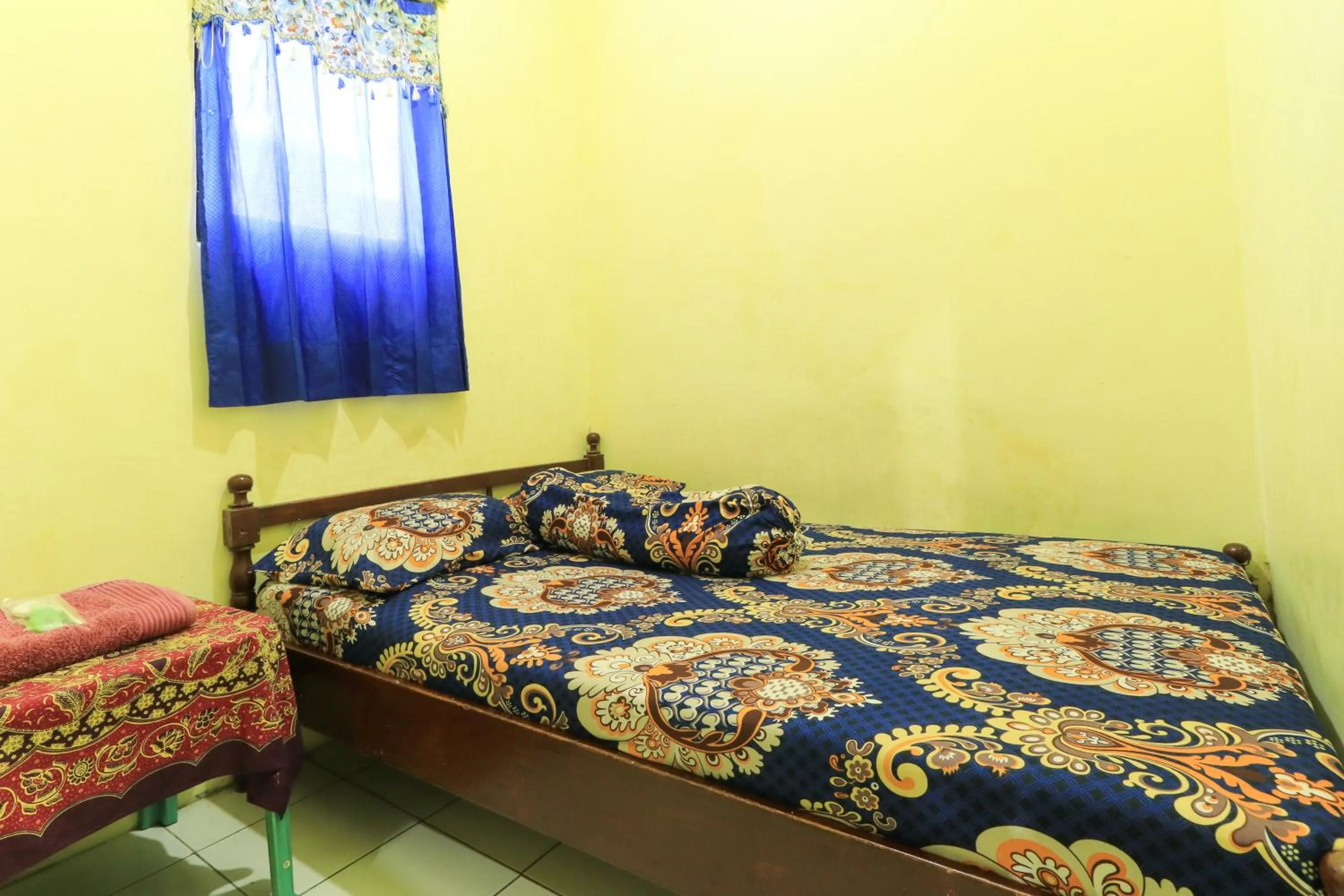 Bedroom, Bed in Dharmawati Homestay Syariah at Terminal Purabaya