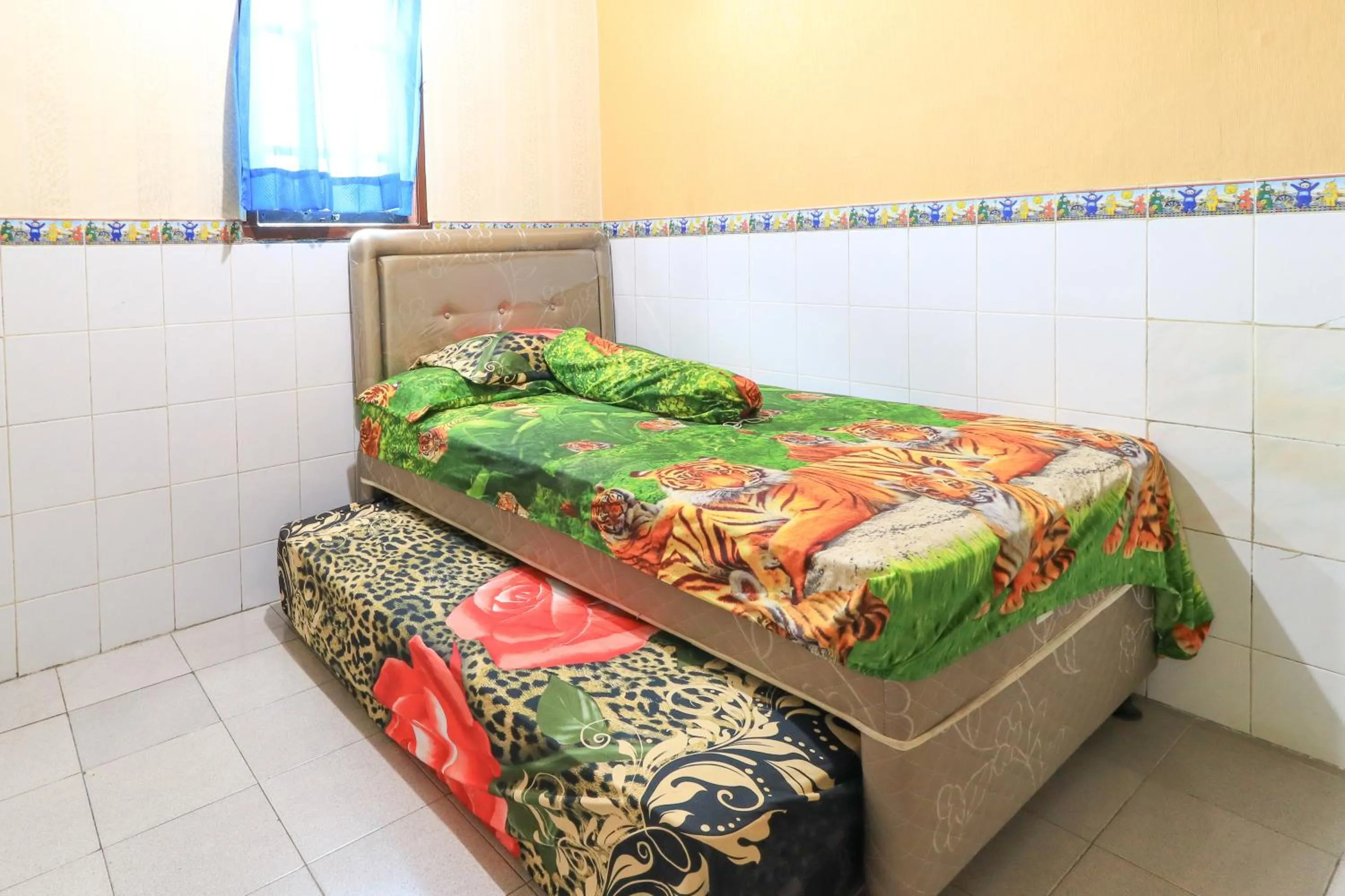 Bedroom, Bed in Dharmawati Homestay Syariah at Terminal Purabaya