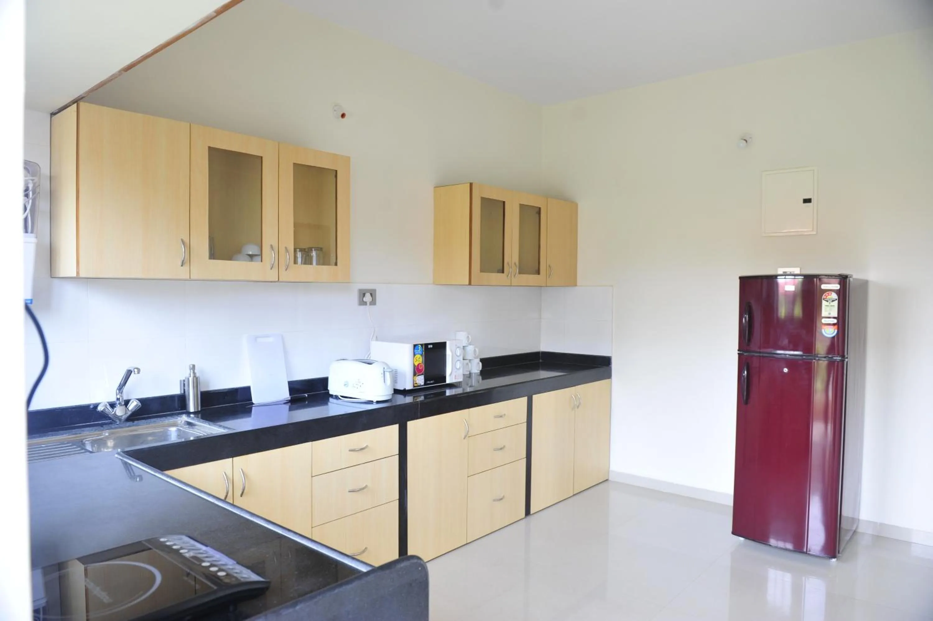 Kitchen or kitchenette in Golden Tulip Candolim, Goa