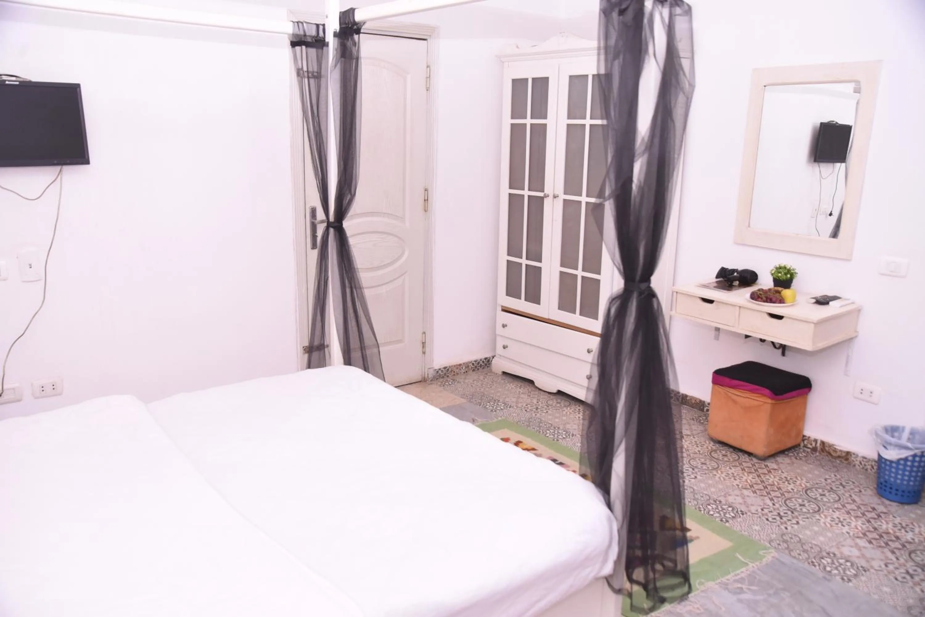 Bed in Arabian Nights Pyramids Guesthouse