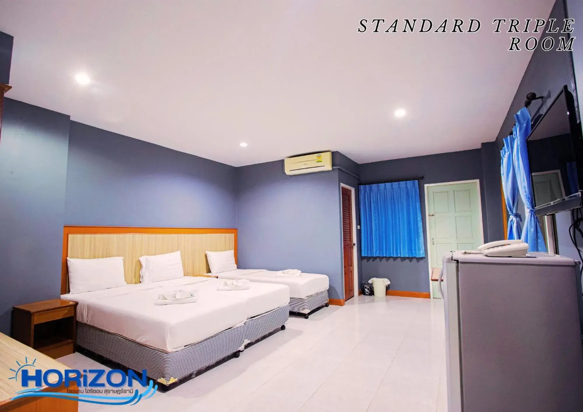 Standard Triple Room in Horizon Hotel Standard Triple Room in Horizon Hotel