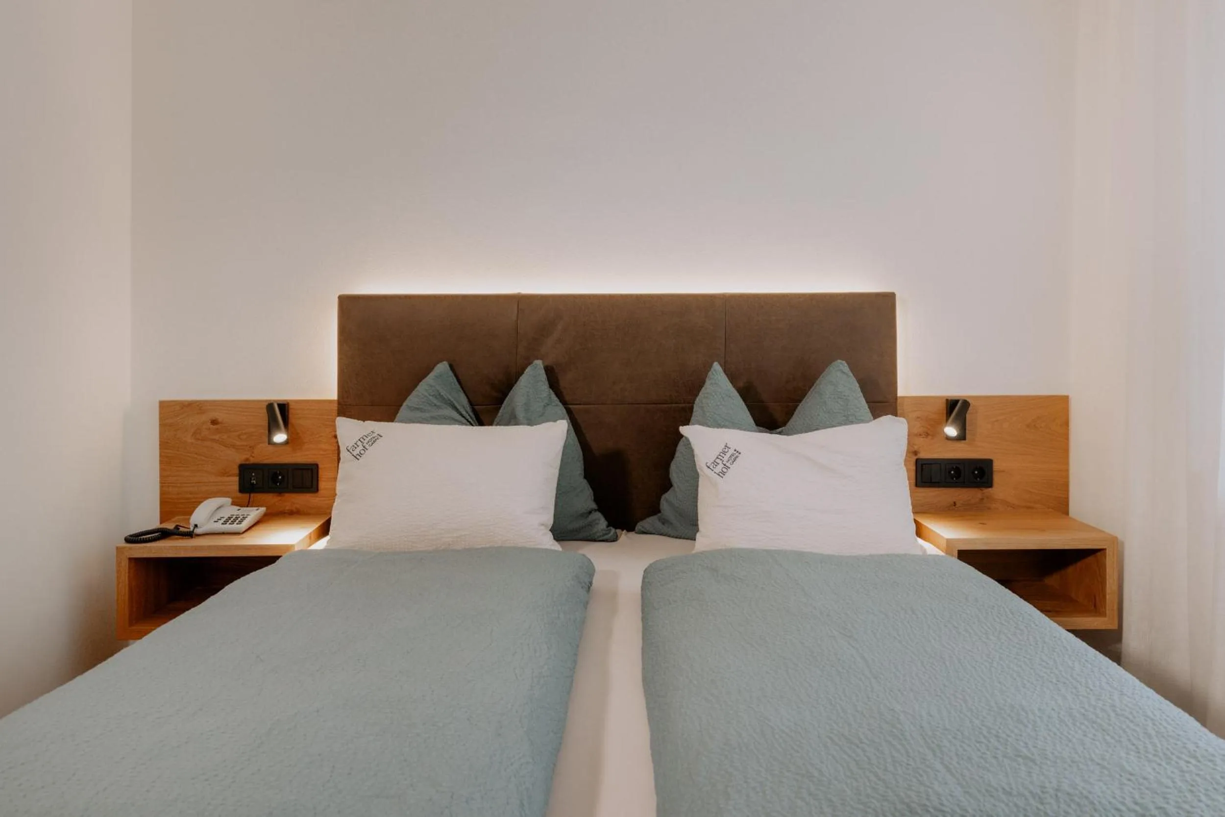 Bed in Garni-Hotel Farmerhof