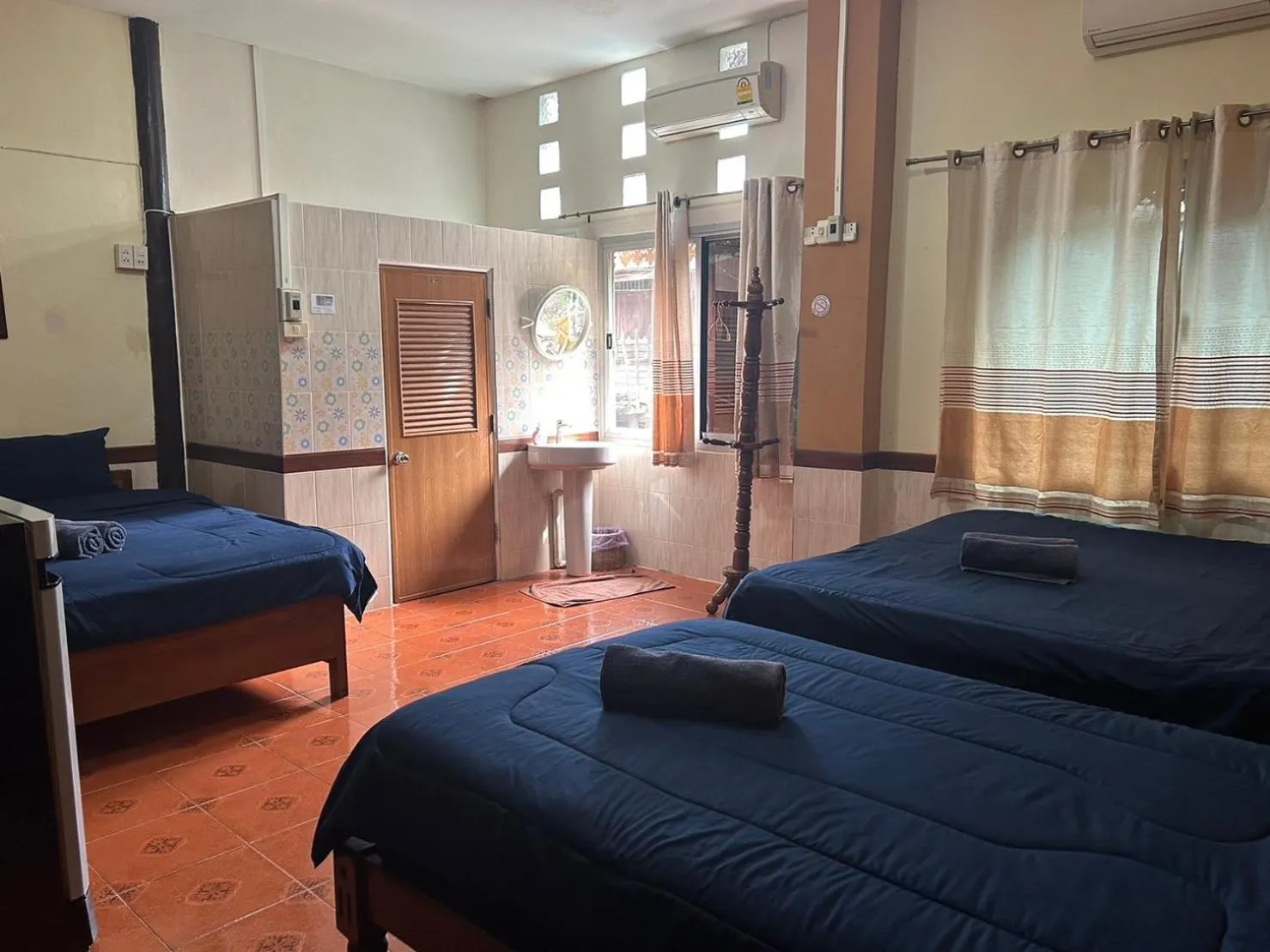 Bed in Baan Are Gong Riverside Homestay