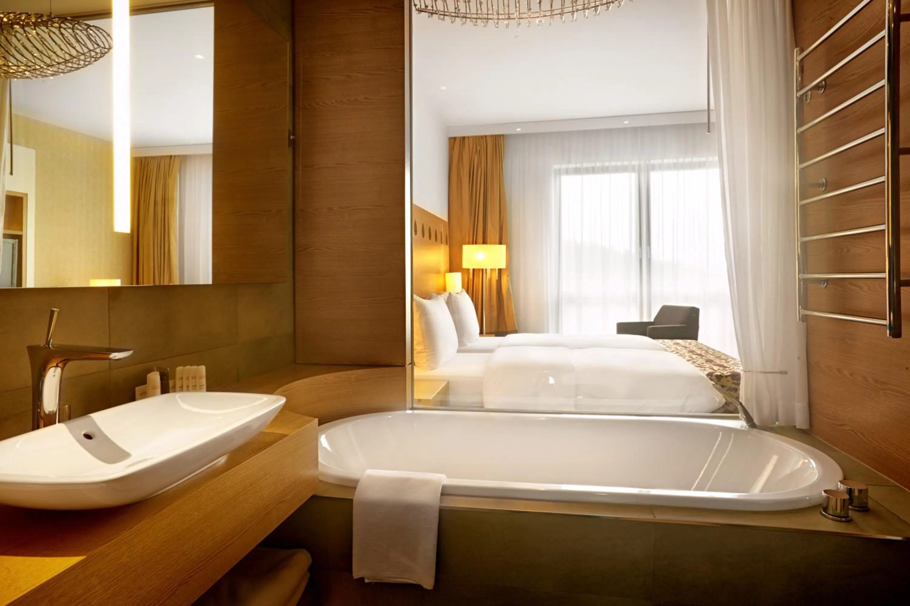 Bathroom, Bed in Radisson Blu Resort Bukovel