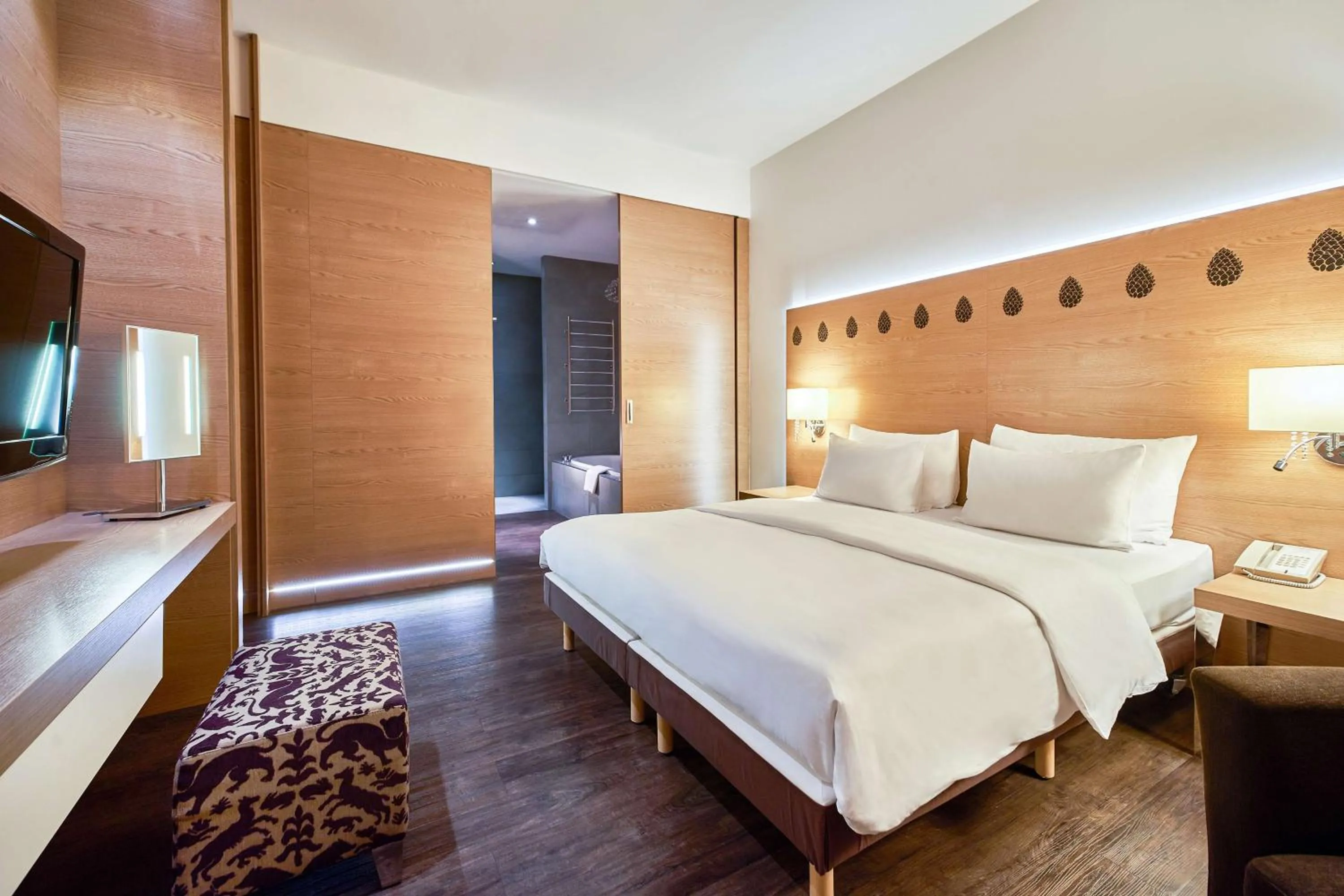 Seating area, Bed in Radisson Blu Resort Bukovel