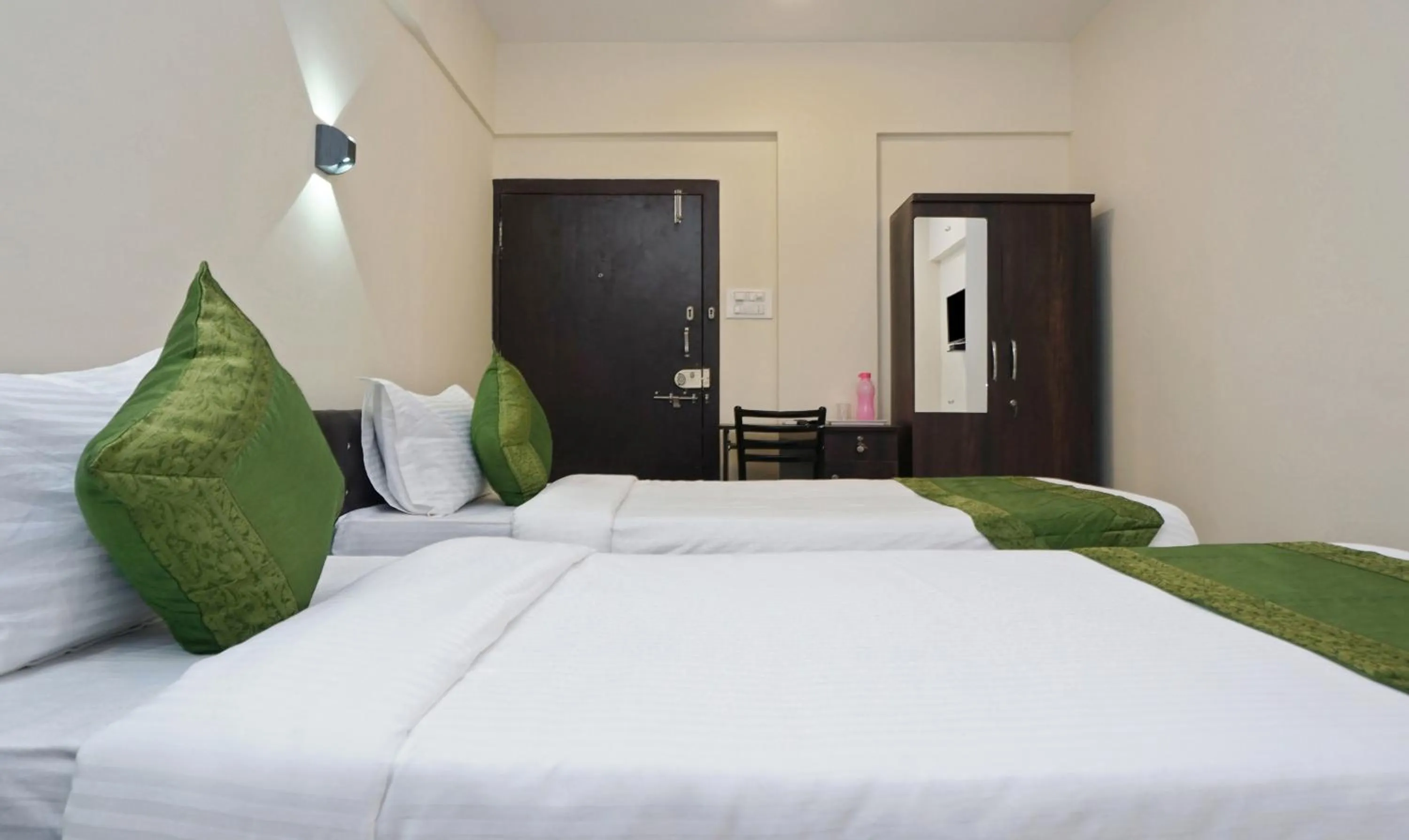 Bedroom, Bed in Treebo Lotus Baner