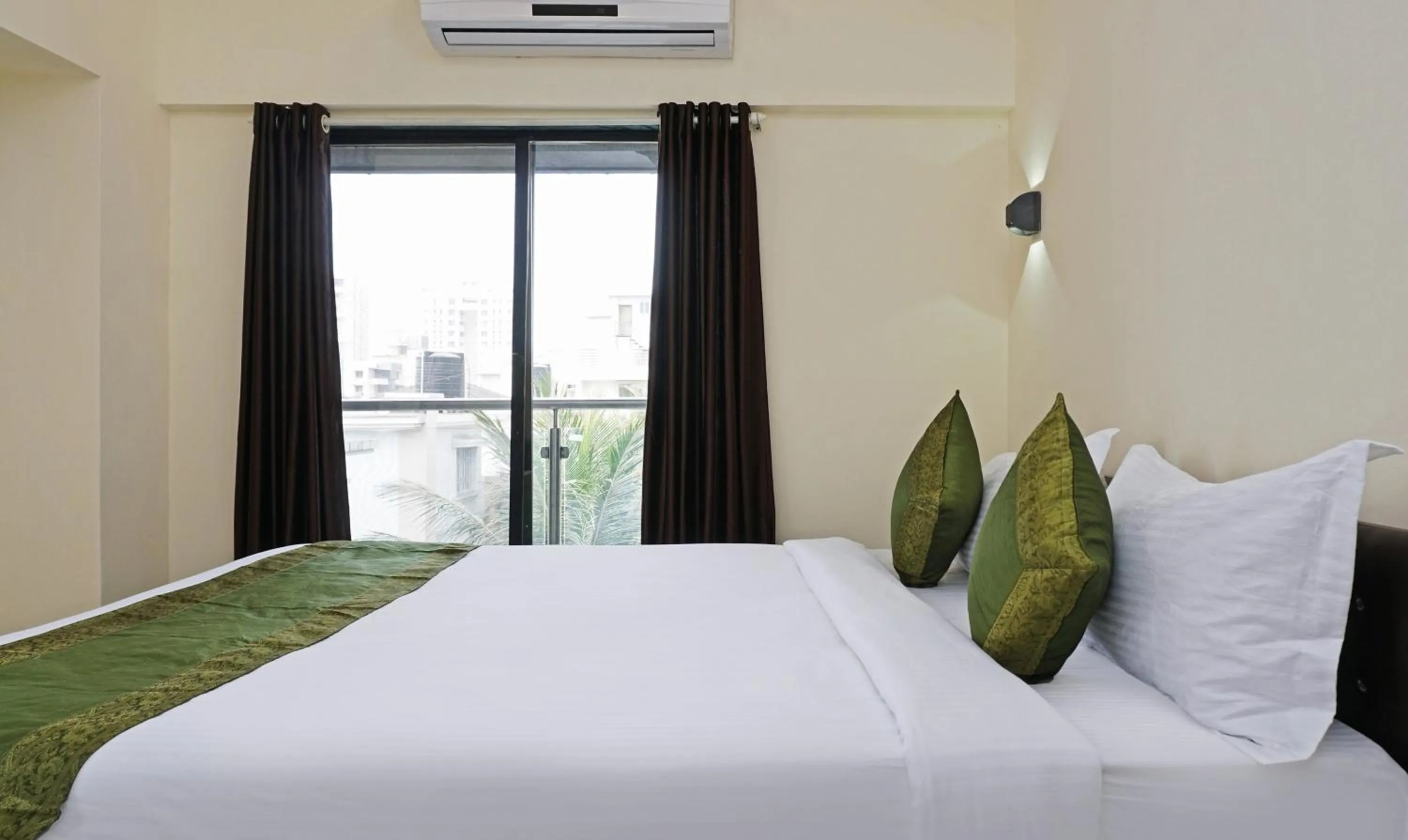 Bedroom, Bed in Treebo Lotus Baner