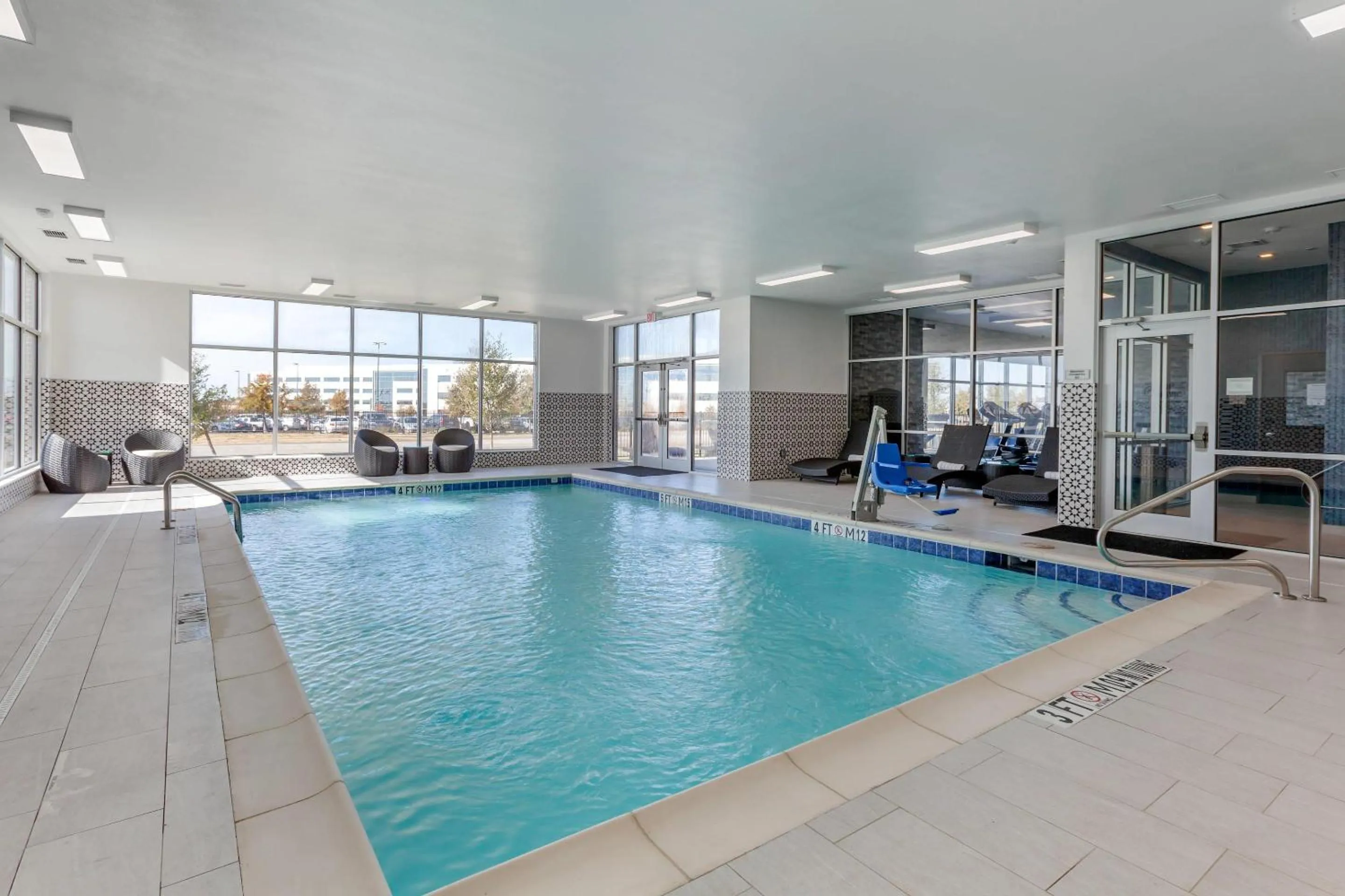 Swimming pool in Cambria Hotel Plano - Richardson Garland