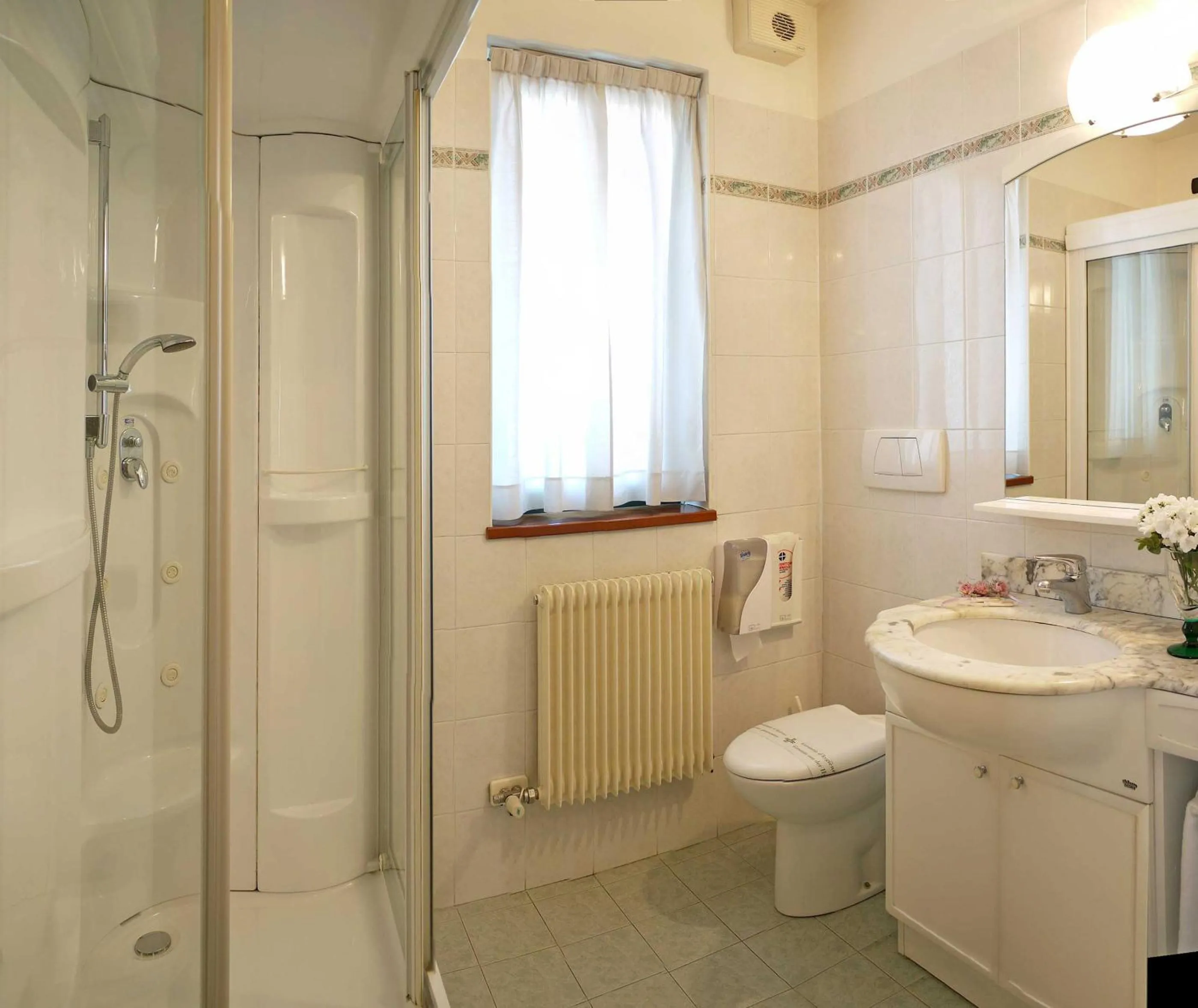 Bathroom in ALA Hotel