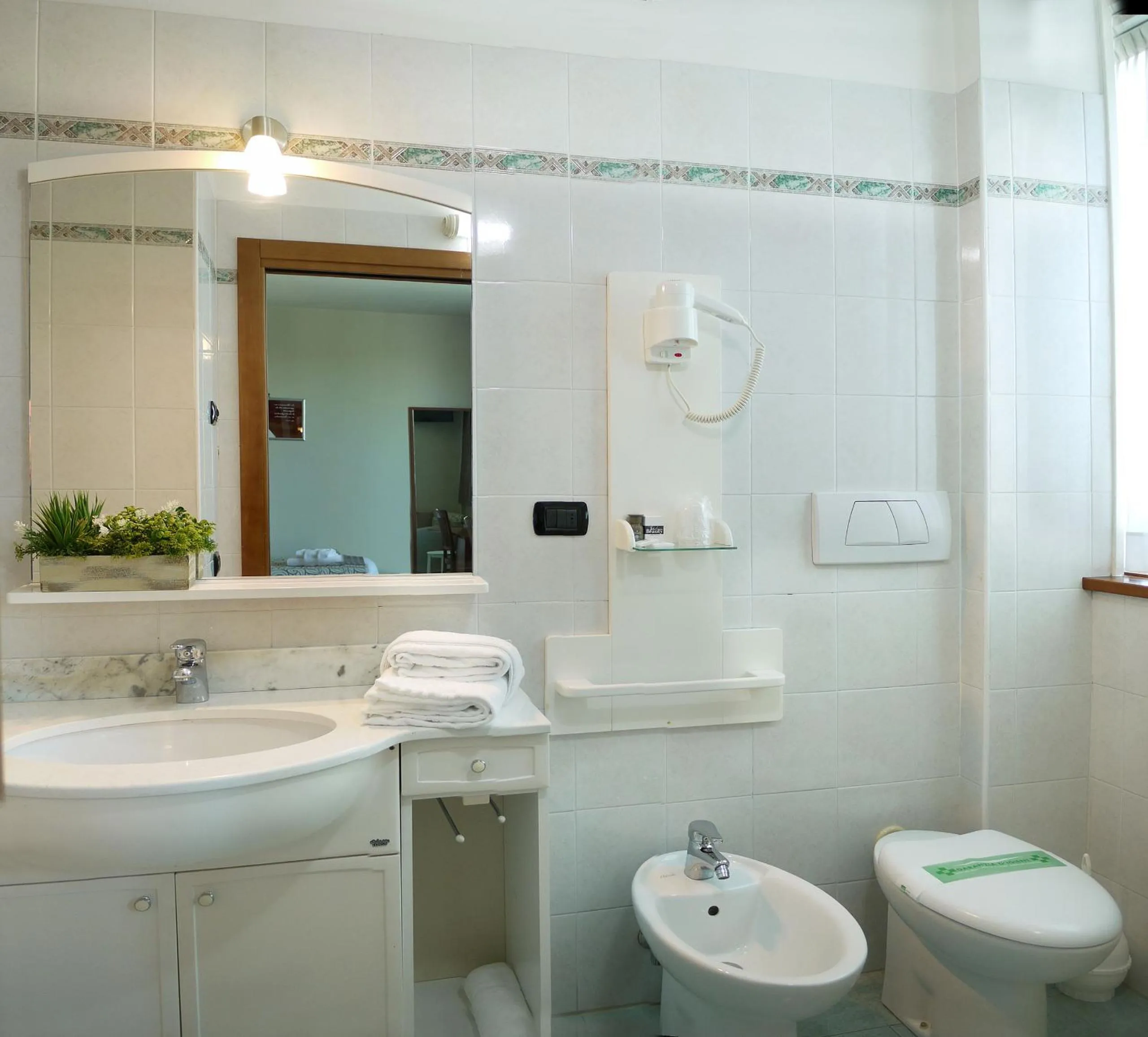 Bathroom in ALA Hotel