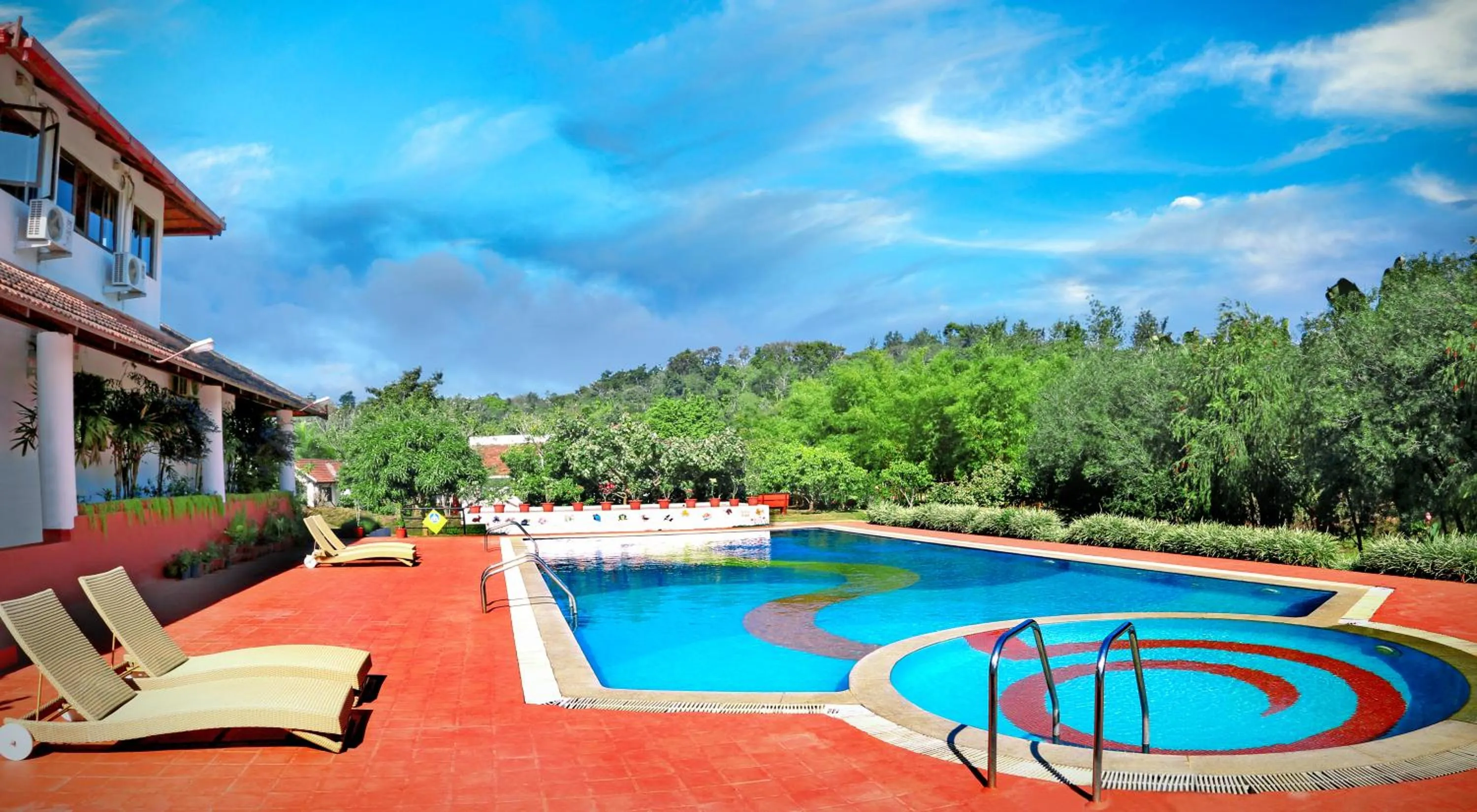 Swimming pool in Kadkani River Resort Coorg