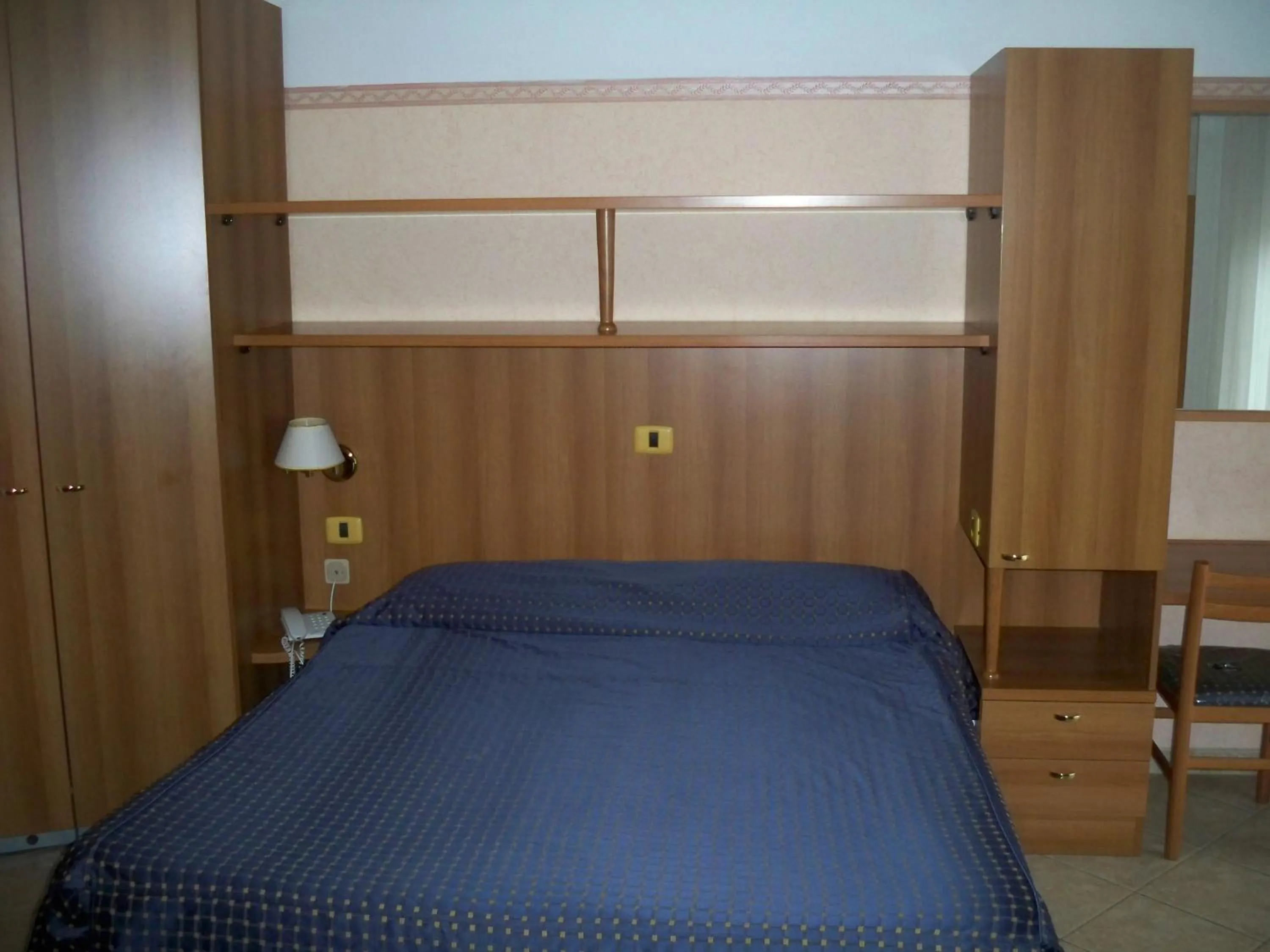 Bed in Albergo Corradetti