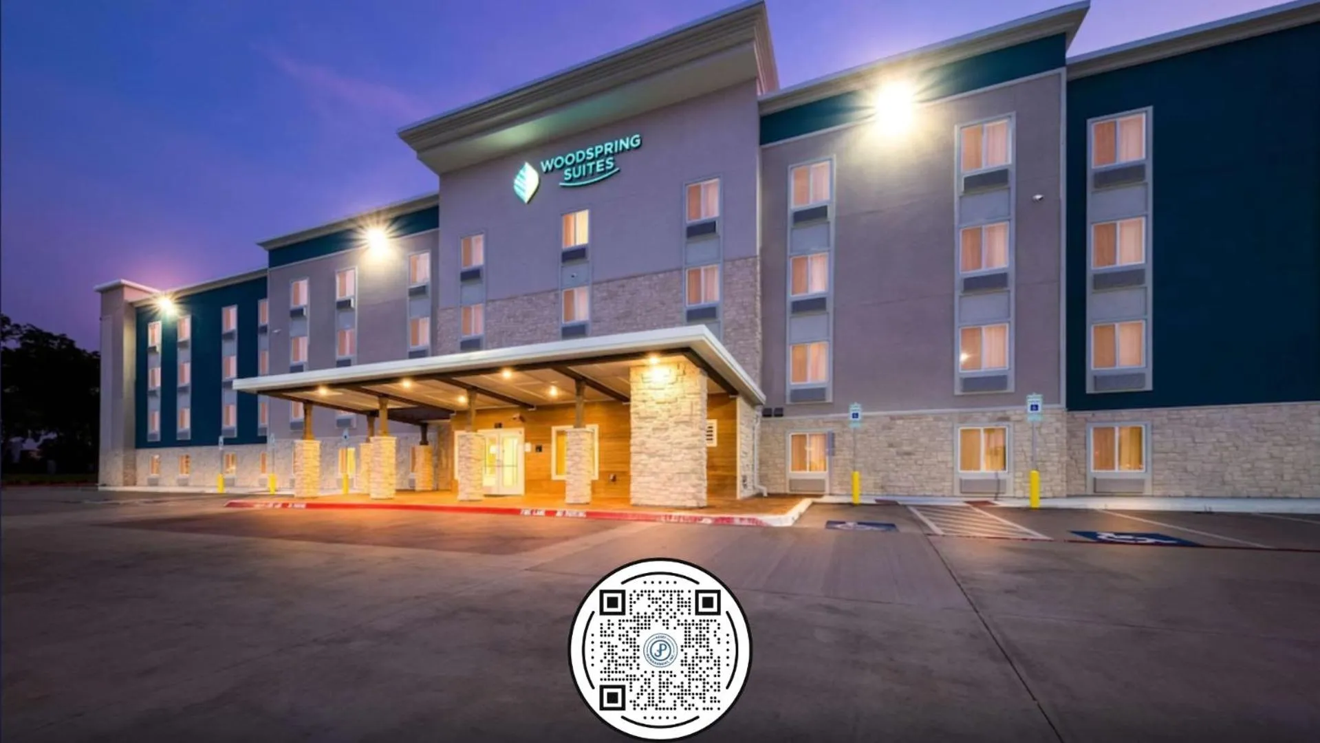 Property building in WoodSpring Suites Dallas Plano Central Legacy Drive