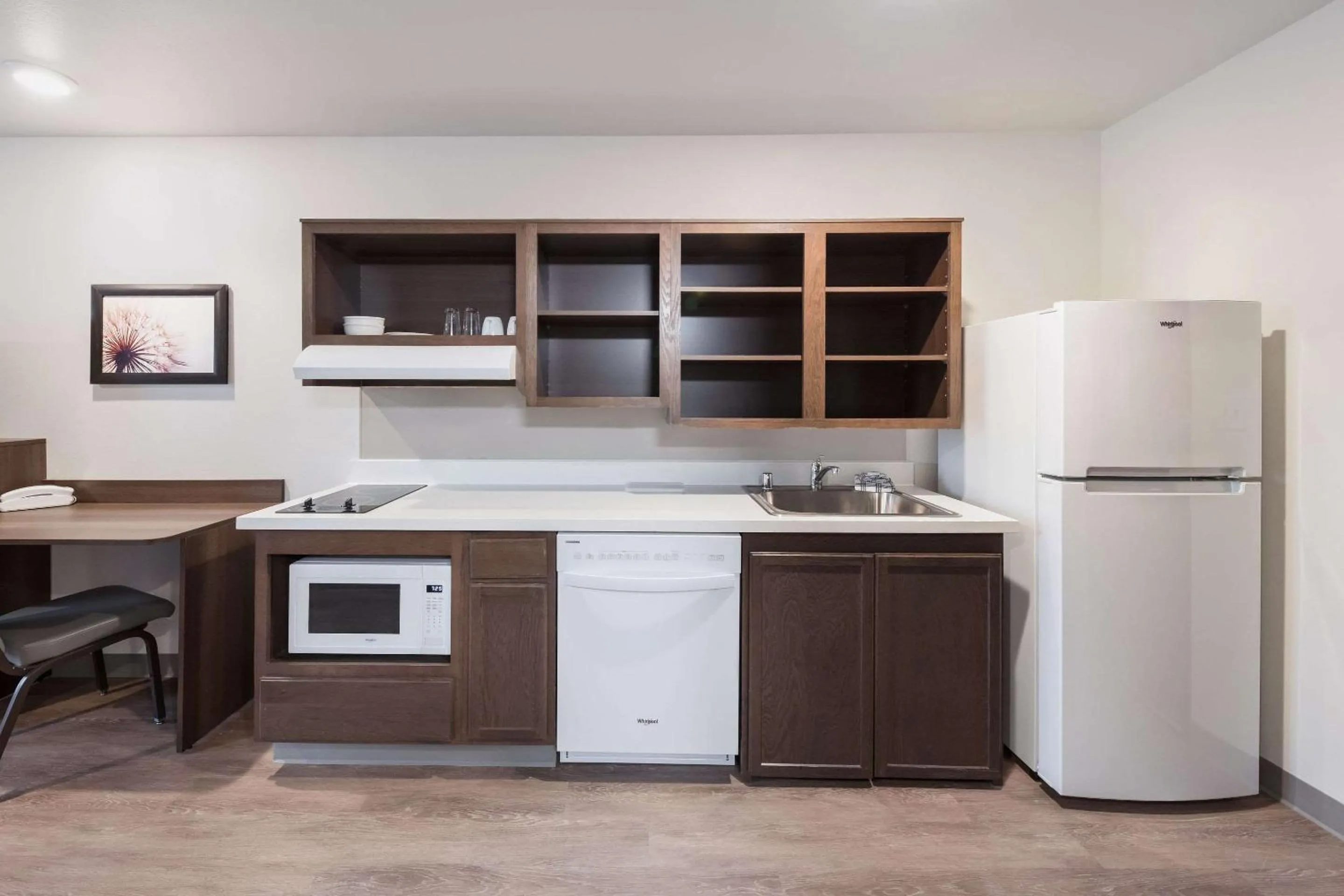 Photo of the whole room in WoodSpring Suites Dallas Plano Central Legacy Drive