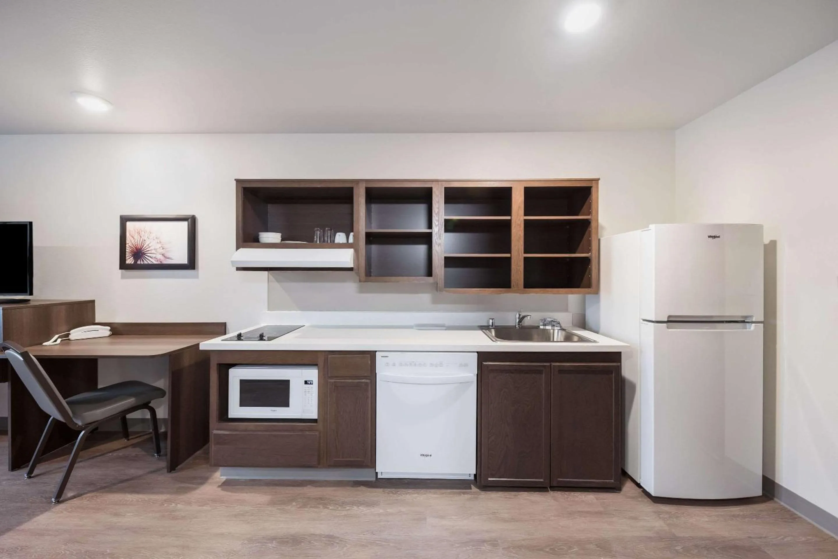 Photo of the whole room in WoodSpring Suites Dallas Plano Central Legacy Drive