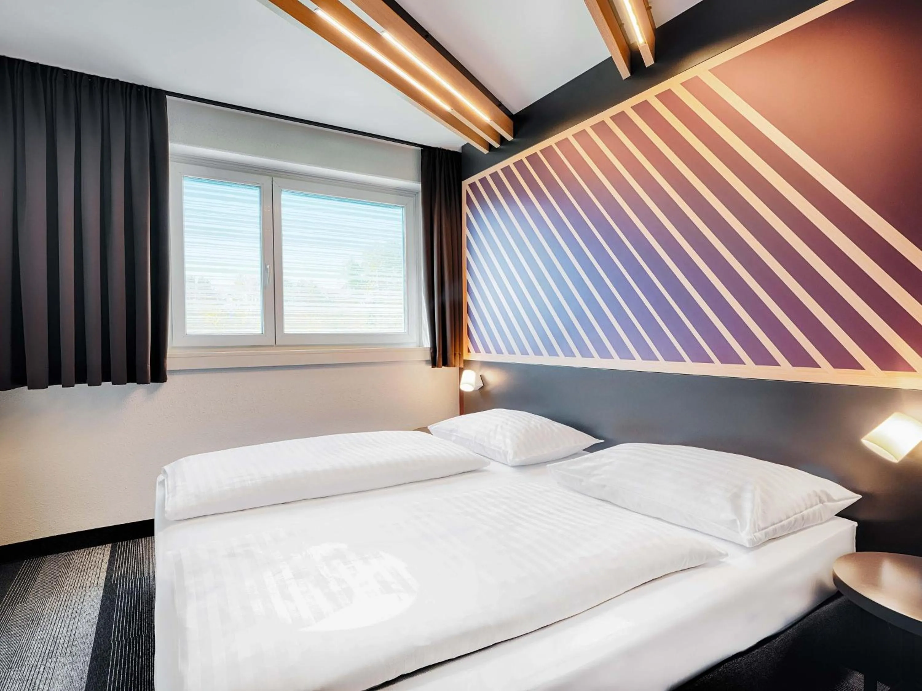 Photo of the whole room, Bed in B&B Hotel Salzburg-Nord