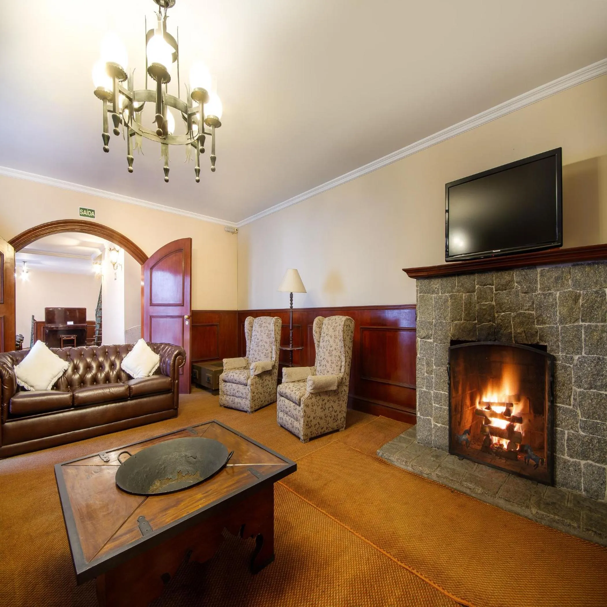 Communal lounge/ TV room in Hotel Chateau