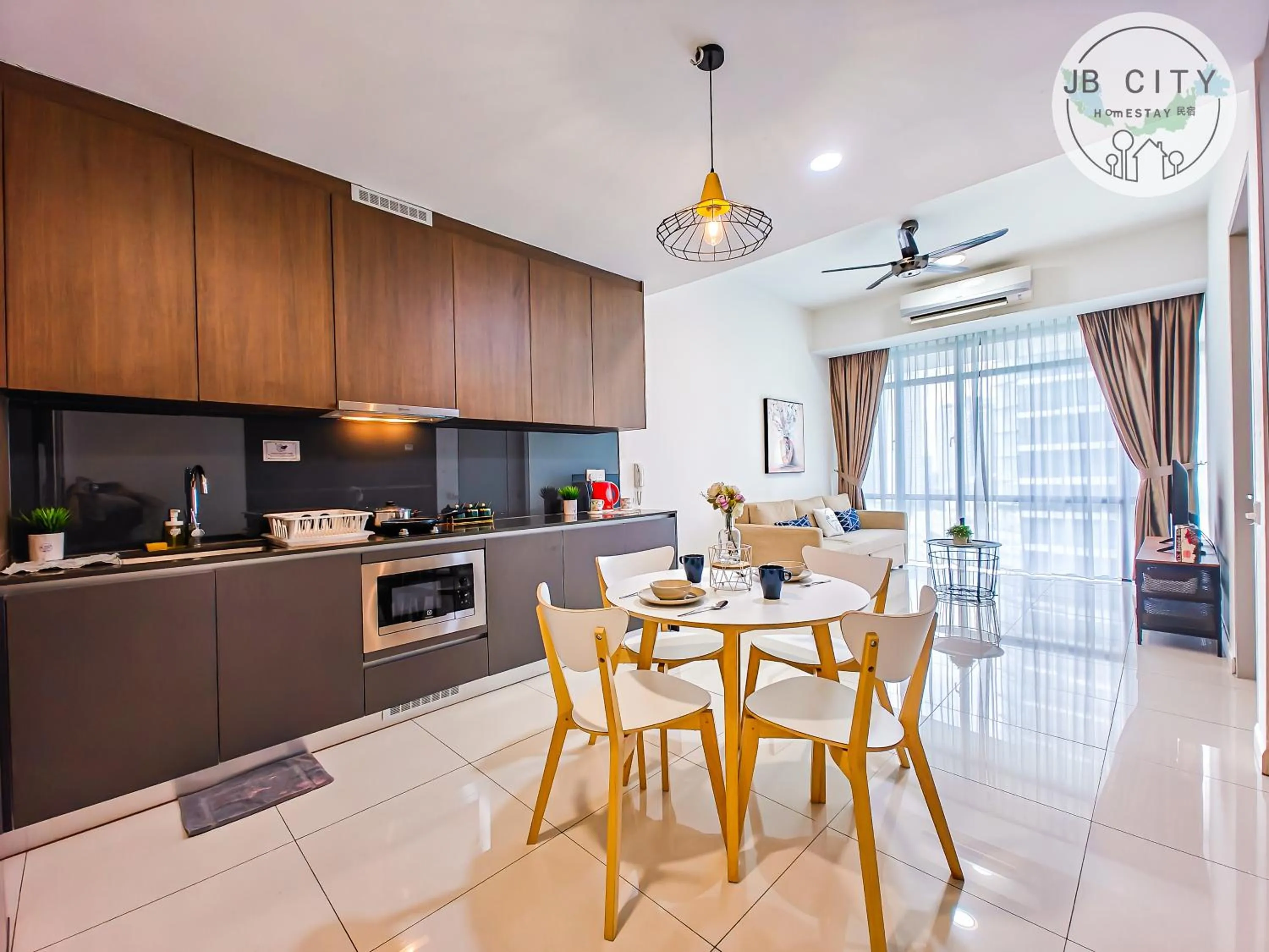 Kitchen or kitchenette in Grand Medini Suites by RR JBcity