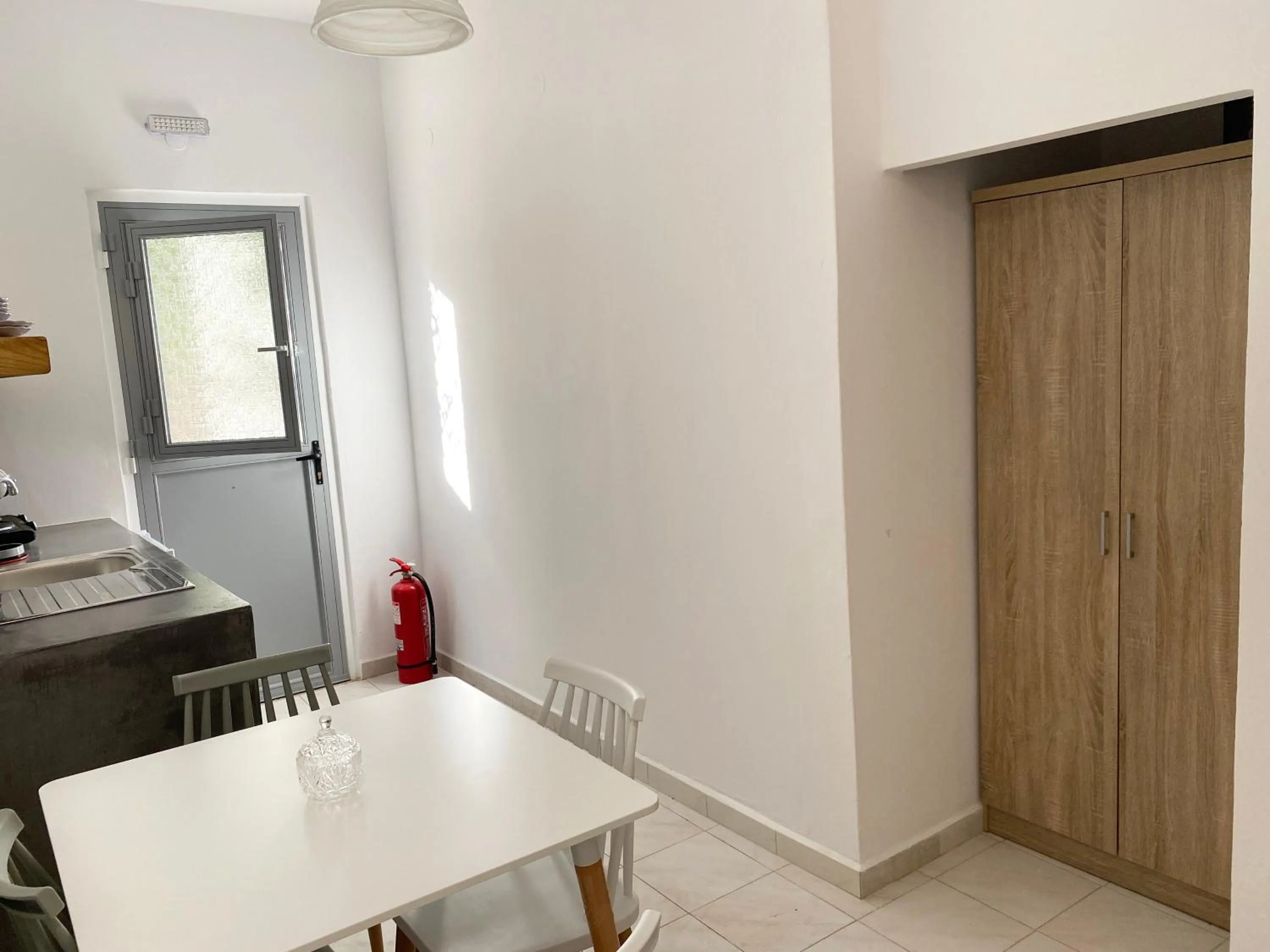 Kitchen or kitchenette in Galini Rooms & Apartments