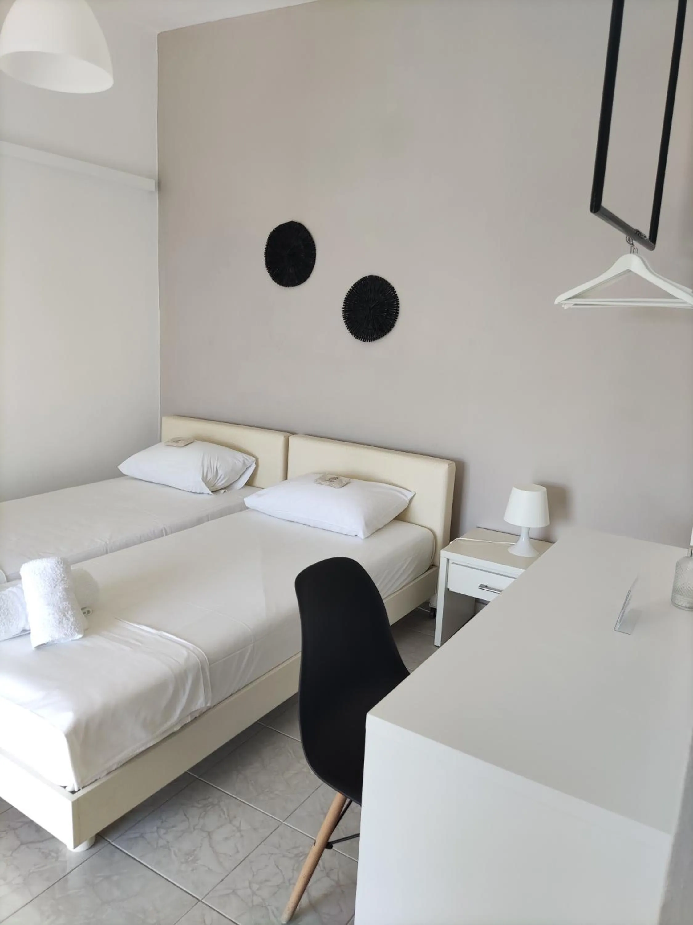 Bed in Galini Rooms & Apartments