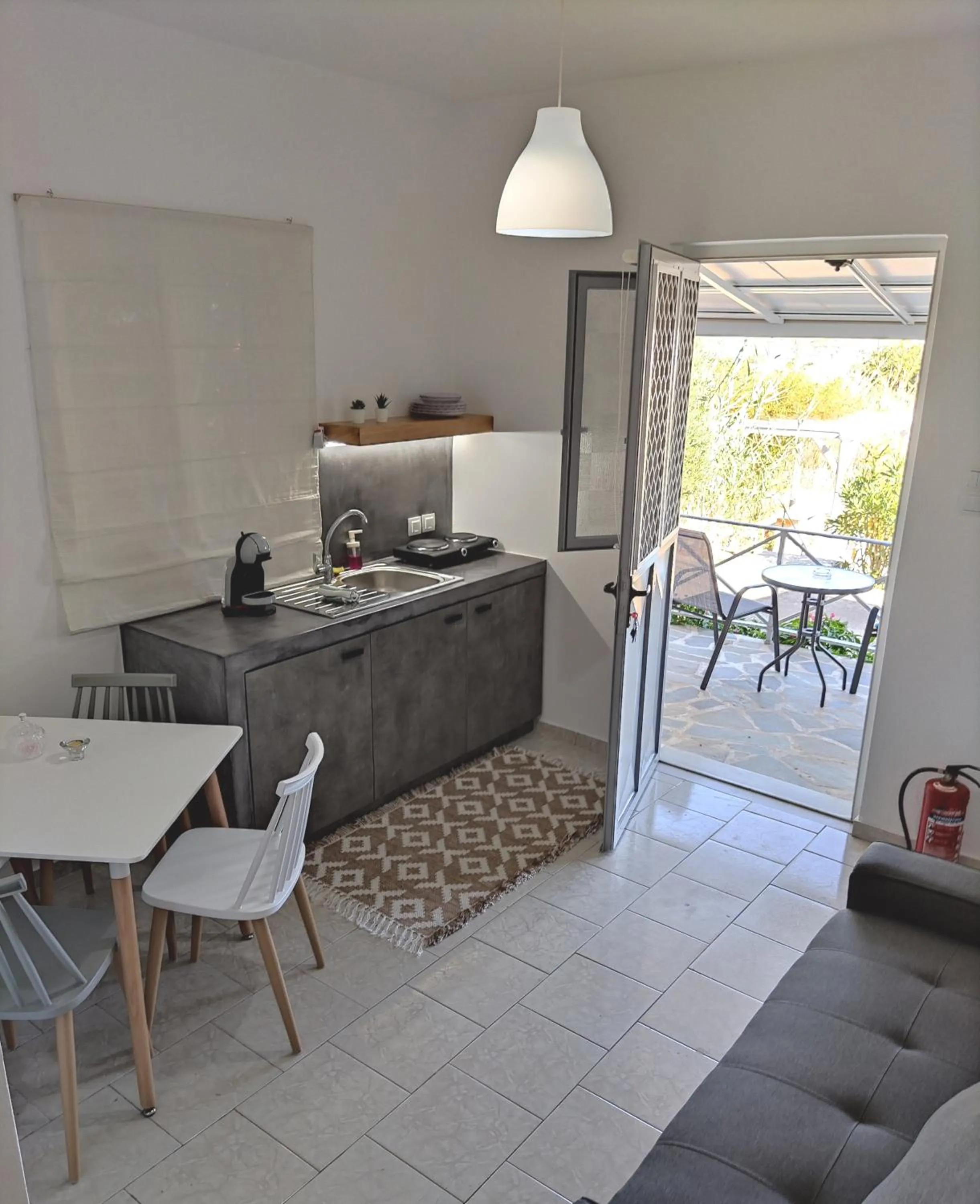 Kitchen or kitchenette in Galini Rooms & Apartments