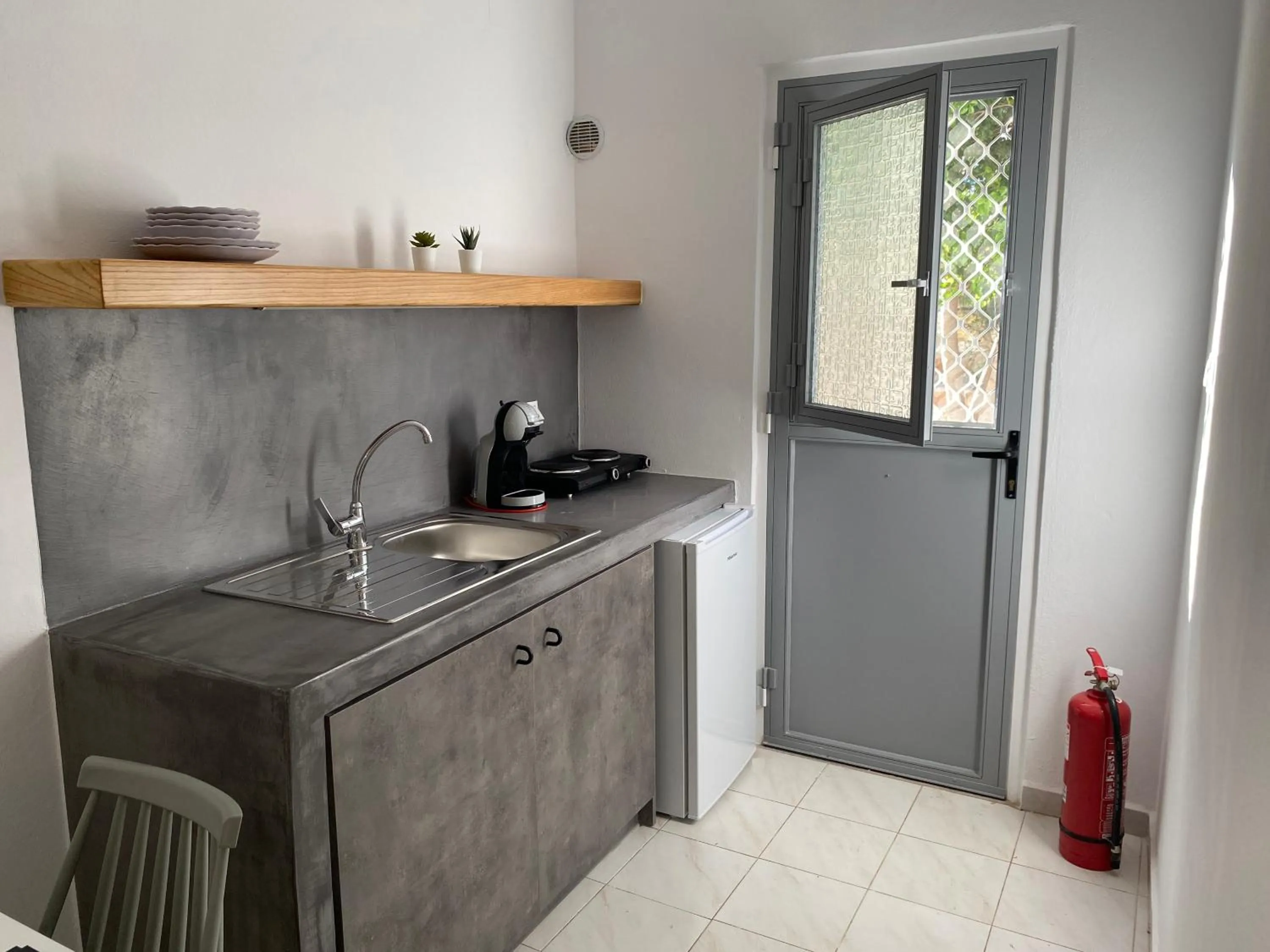 Kitchen or kitchenette in Galini Rooms & Apartments