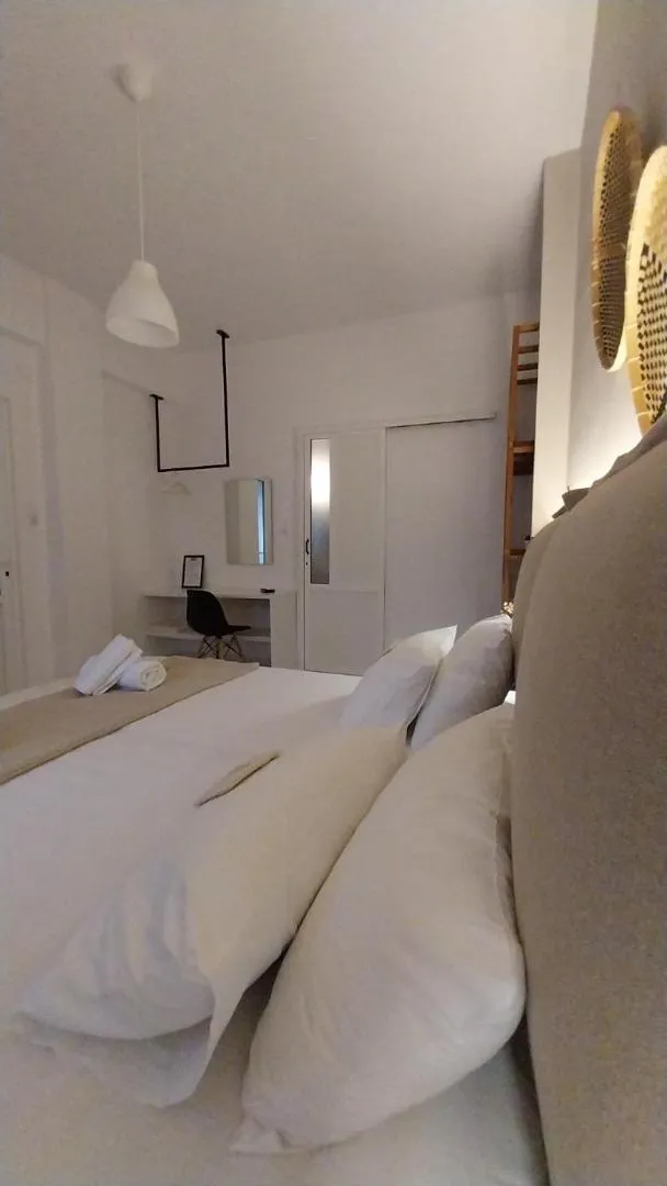 Bed in Galini Rooms & Apartments