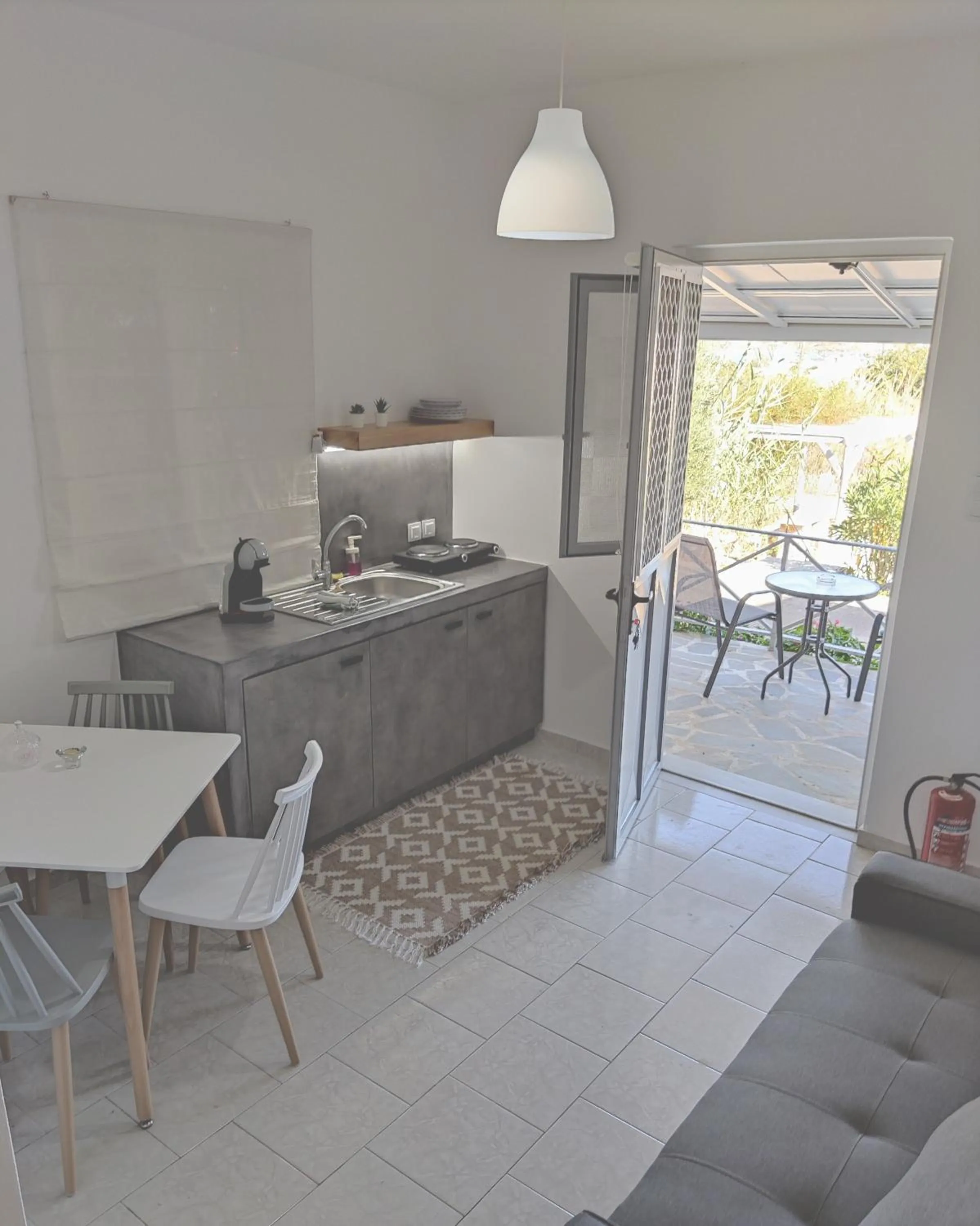 Kitchen or kitchenette in Galini Rooms & Apartments