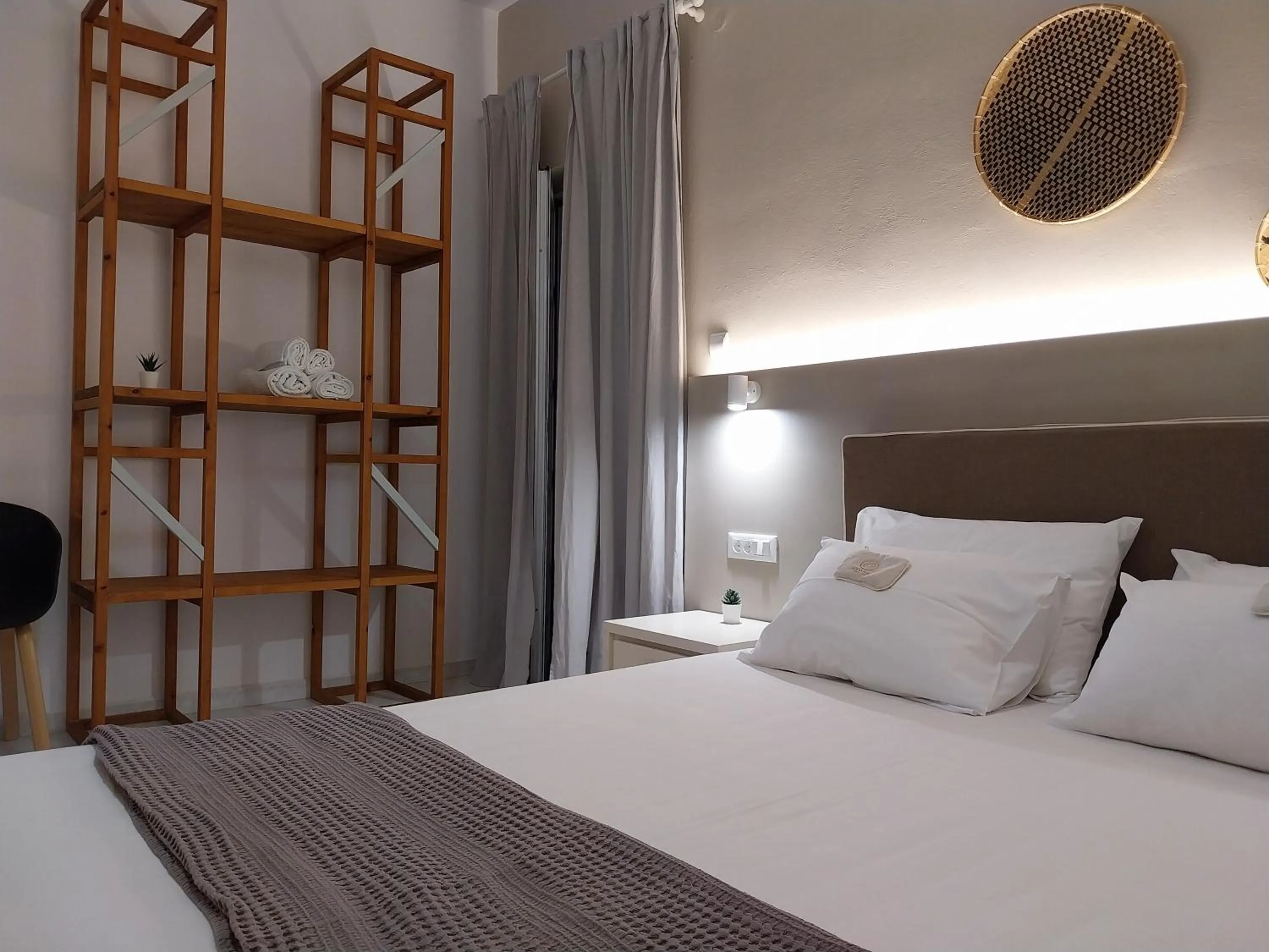 Bed in Galini Rooms & Apartments